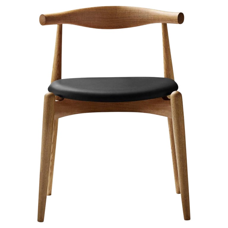 https://a.1stdibscdn.com/hans-j-wegner-ch20-chair-in-oak-black-leather-oil-for-carl-hansen-son-for-sale/1121189/f_316338121740493324049/31633812_datamatics.jpg?width=768