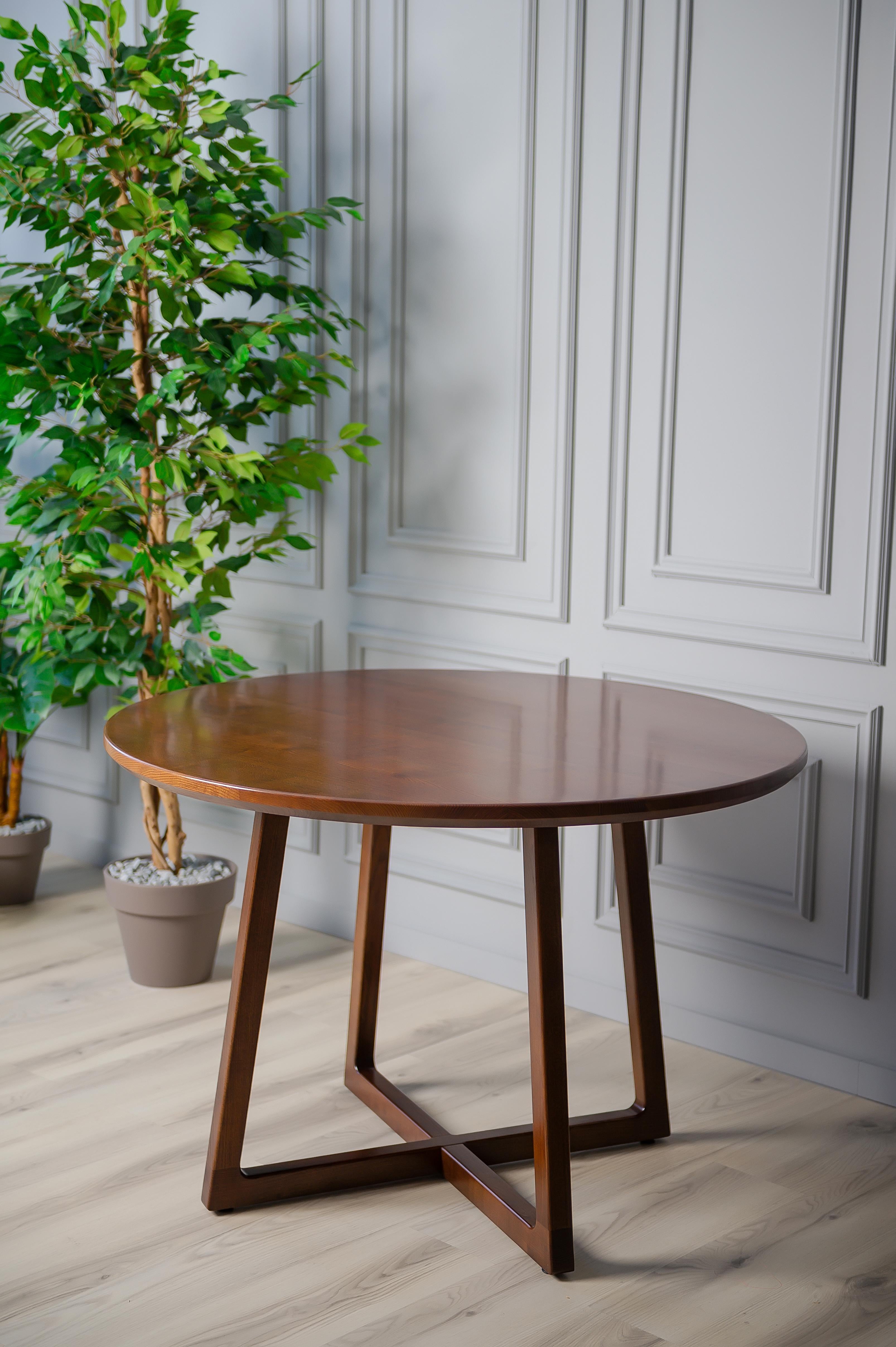 https://a.1stdibscdn.com/dark-brown-ash-solid-wood-round-dining-table-for-sale-picture-3/f_82682/f_330119021677516407267/323_master.jpg