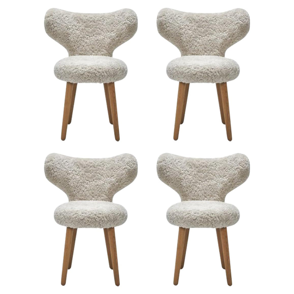 https://a.1stdibscdn.com/set-of-4-white-dining-wng-chairs-in-oak-and-sheepskin-upholstery-by-mazo-design-for-sale/1121189/f_325167321675359170657/32516732_datamatics.jpg