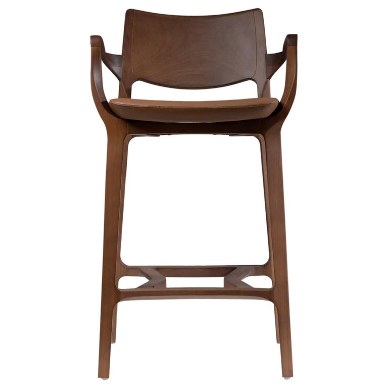 https://a.1stdibscdn.com/post-modern-stool-in-walnut-finish-cane-back-leather-seat-counter-or-bar-height-for-sale/1121189/f_335528721680339820278/33552872_datamatics.jpg?width=768
