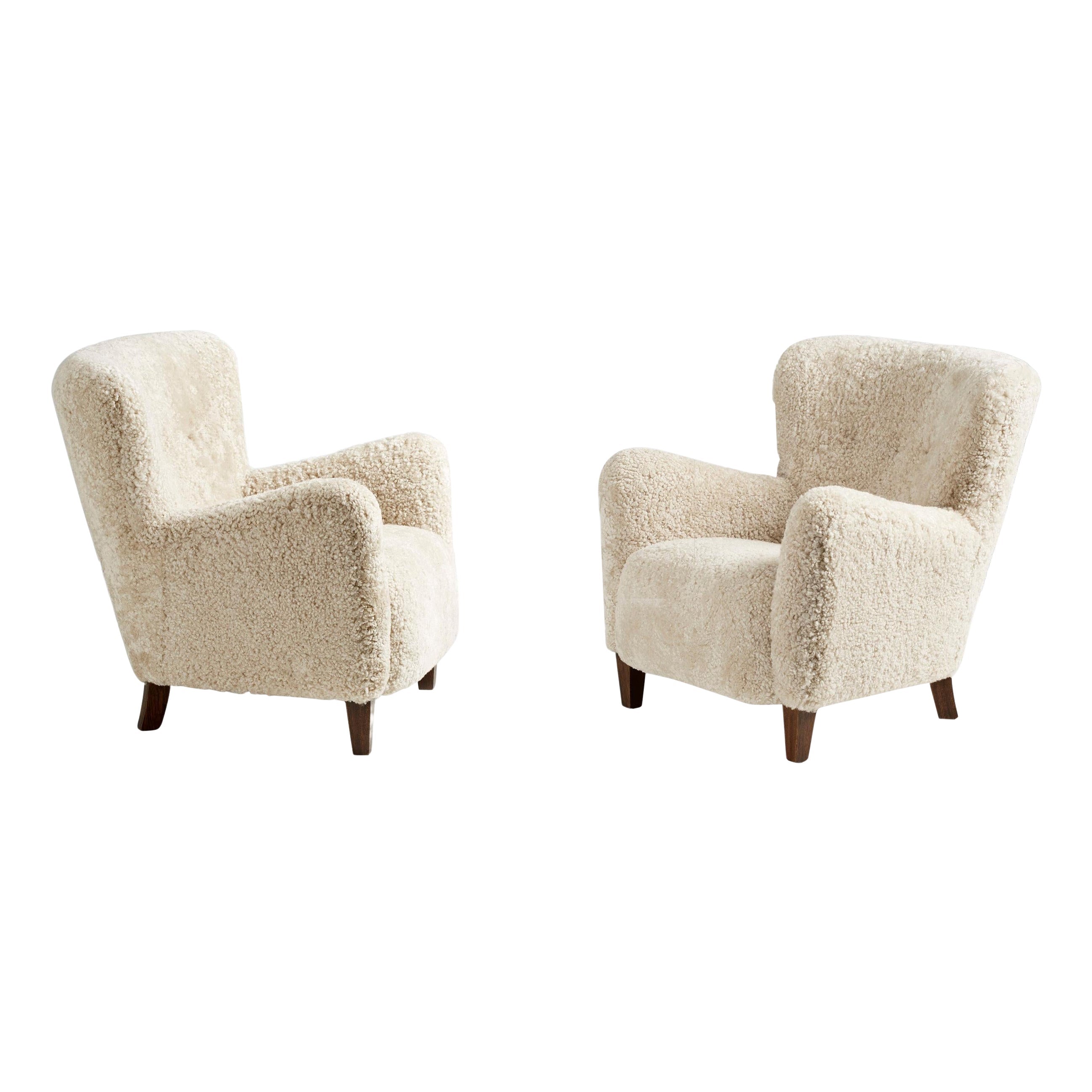 https://a.1stdibscdn.com/pair-of-custom-made-ryo-low-sheepskin-lounge-chairs-for-sale/1121189/f_336750821711374847141/33675082_datamatics.jpg