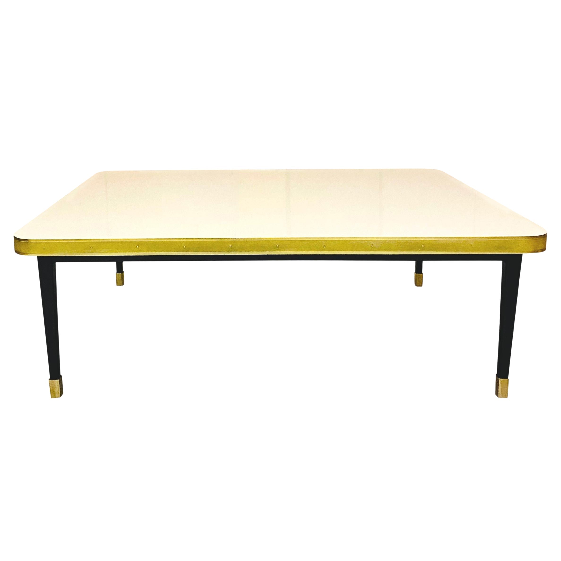 https://a.1stdibscdn.com/low-table-high-gloss-top-brass-tape-framed-black-conical-legs-brass-end-large-for-sale/1121189/f_338704421681953592626/33870442_datamatics.jpg