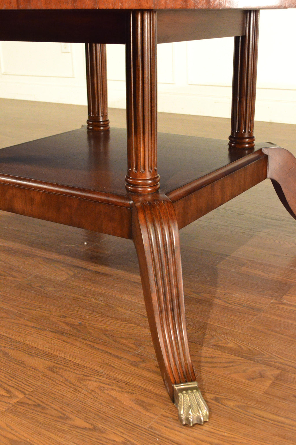 https://a.1stdibscdn.com/large-round-perimeter-leaf-mahogany-georgian-style-dining-table-by-leighton-hall-for-sale-picture-12/f_44162/f_146972821557706348040/33B3109D_E037_4644_AE72_8F073F503504_master.jpeg