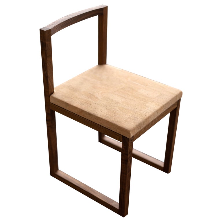 https://a.1stdibscdn.com/walnut-wood-and-cork-chair-dining-or-writing-desk-chair-porto-chair-for-sale/1121189/f_343254721684499067865/34325472_datamatics.jpg?width=768