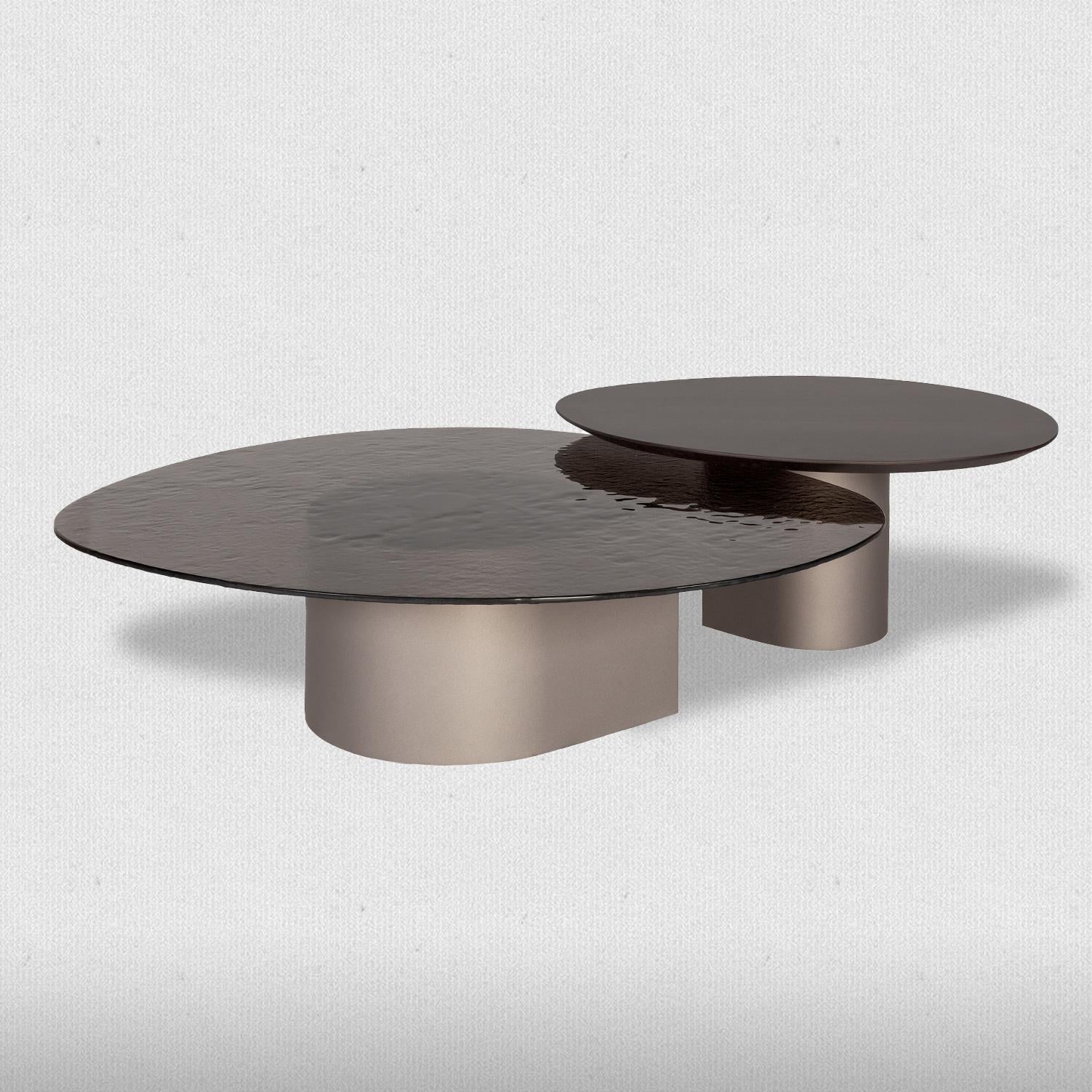 https://a.1stdibscdn.com/set-of-two-frosted-glass-low-tables-with-custom-lacquered-metal-base-for-sale-picture-2/f_27693/f_412688221725007674154/347236828_631531342344220_4101016829947903245_n_master.jpg
