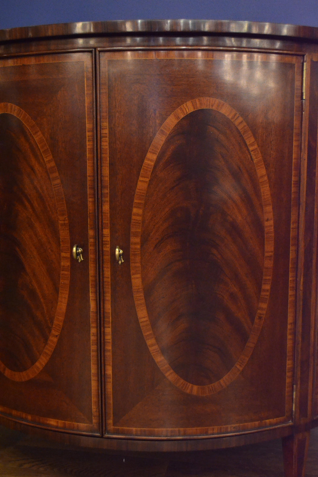 https://a.1stdibscdn.com/hepplewhite-style-mahogany-demilune-cabinet-by-leighton-hall-for-sale-picture-6/f_44162/f_15469622/34F1D370_0FE9_4CD9_A7BC_1563204057346_master.jpeg
