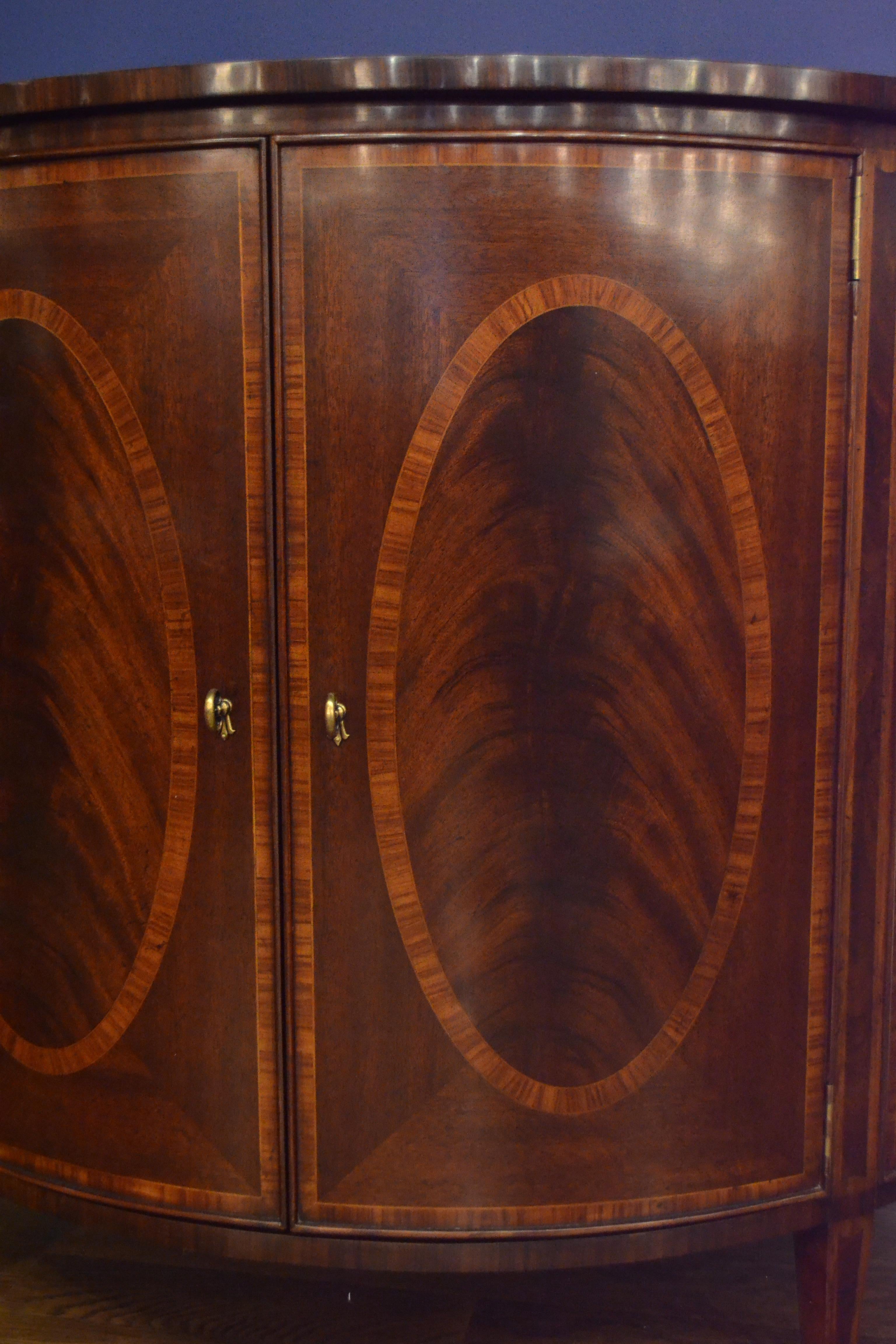 https://a.1stdibscdn.com/hepplewhite-style-mahogany-demilune-cabinet-by-leighton-hall-for-sale-picture-6/f_44162/f_15469622/34F1D370_0FE9_4CD9_A7BC_1563204057346_master.jpeg