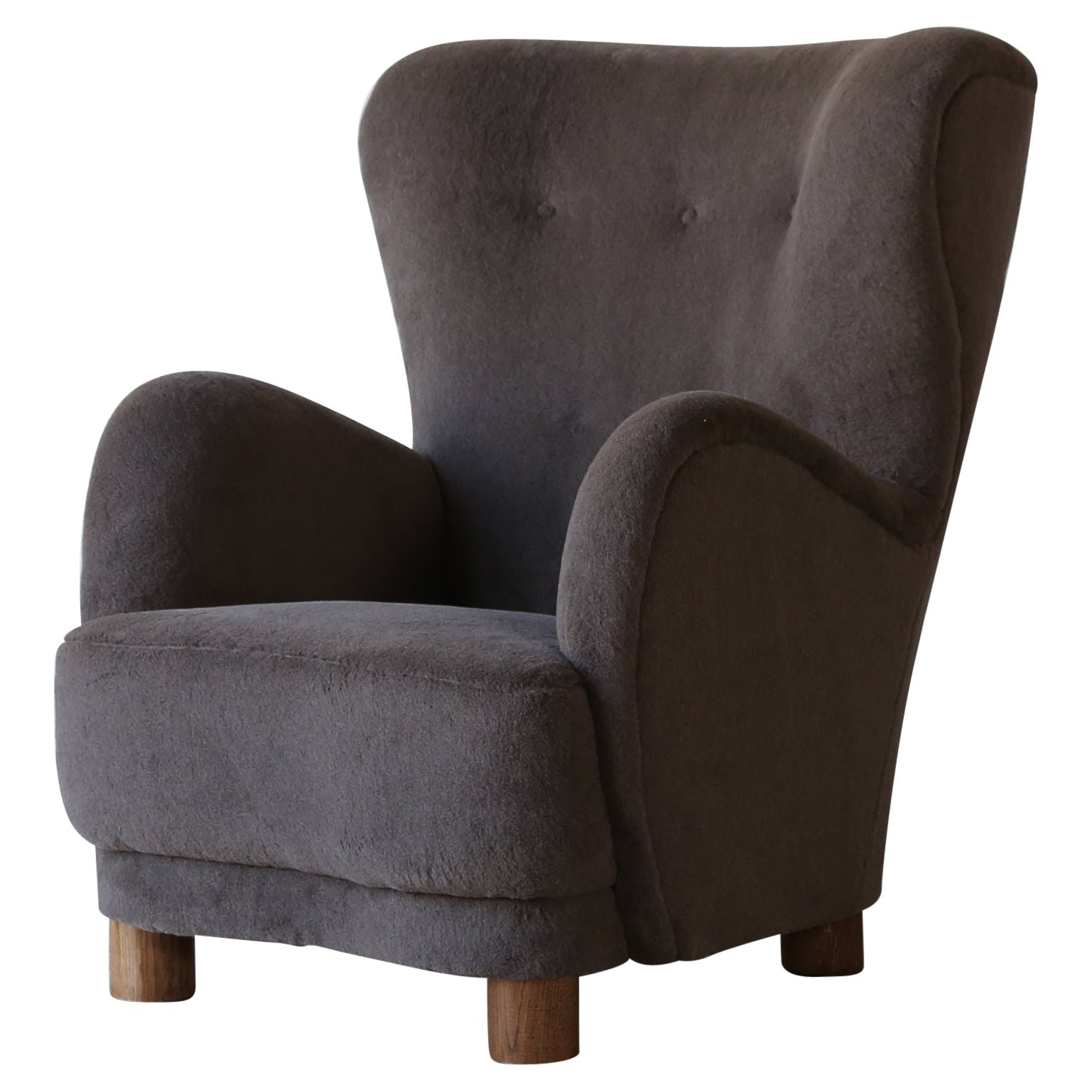 https://a.1stdibscdn.com/a-high-back-arm-chair-upholstered-in-pure-alpaca-wool-for-sale/1121189/f_352901921689862405036/35290192_datamatics.jpg