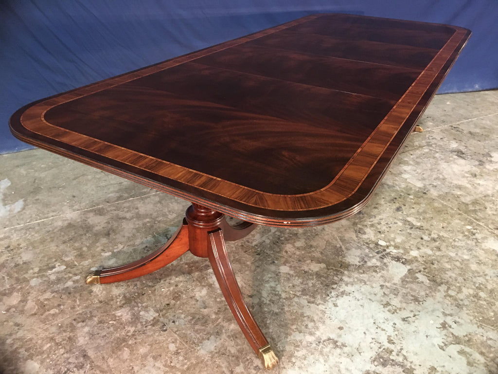 https://a.1stdibscdn.com/custom-multi-banded-mahogany-georgian-style-dining-table-by-leighton-hall-for-sale-picture-7/f_44162/f_173475721577241230782/35C4B884_F1A7_4717_989F_F50BDE182686_master.jpeg