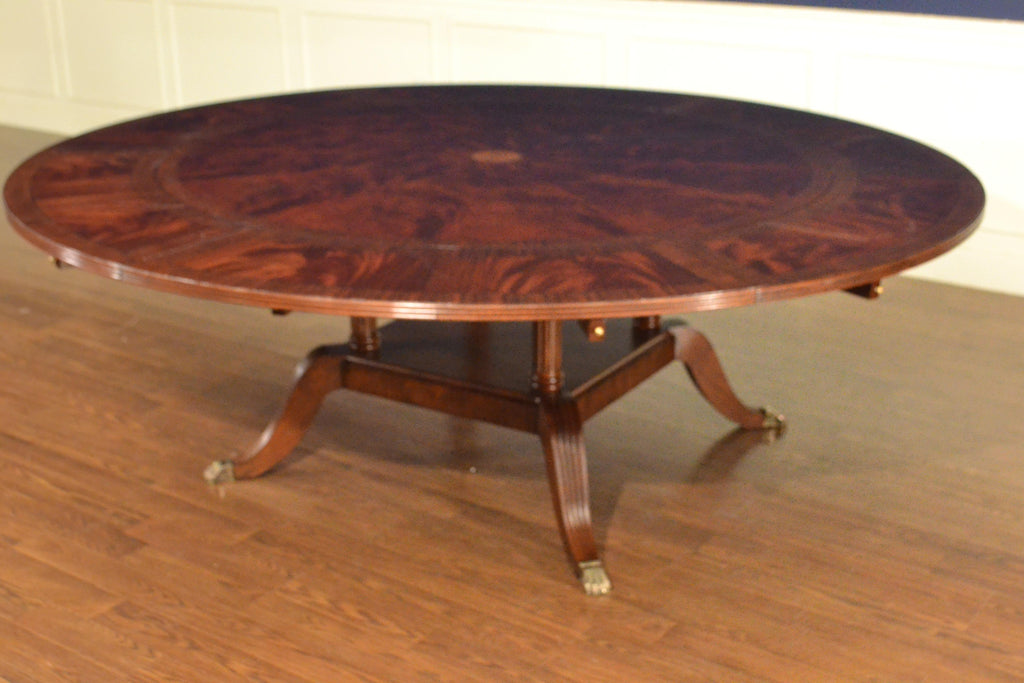 https://a.1stdibscdn.com/large-round-perimeter-leaf-mahogany-georgian-style-dining-table-by-leighton-hall-for-sale-picture-9/f_44162/f_146972821557706176606/38CCEC9F_CE36_494D_8242_7B4433B43C3B_master.jpeg