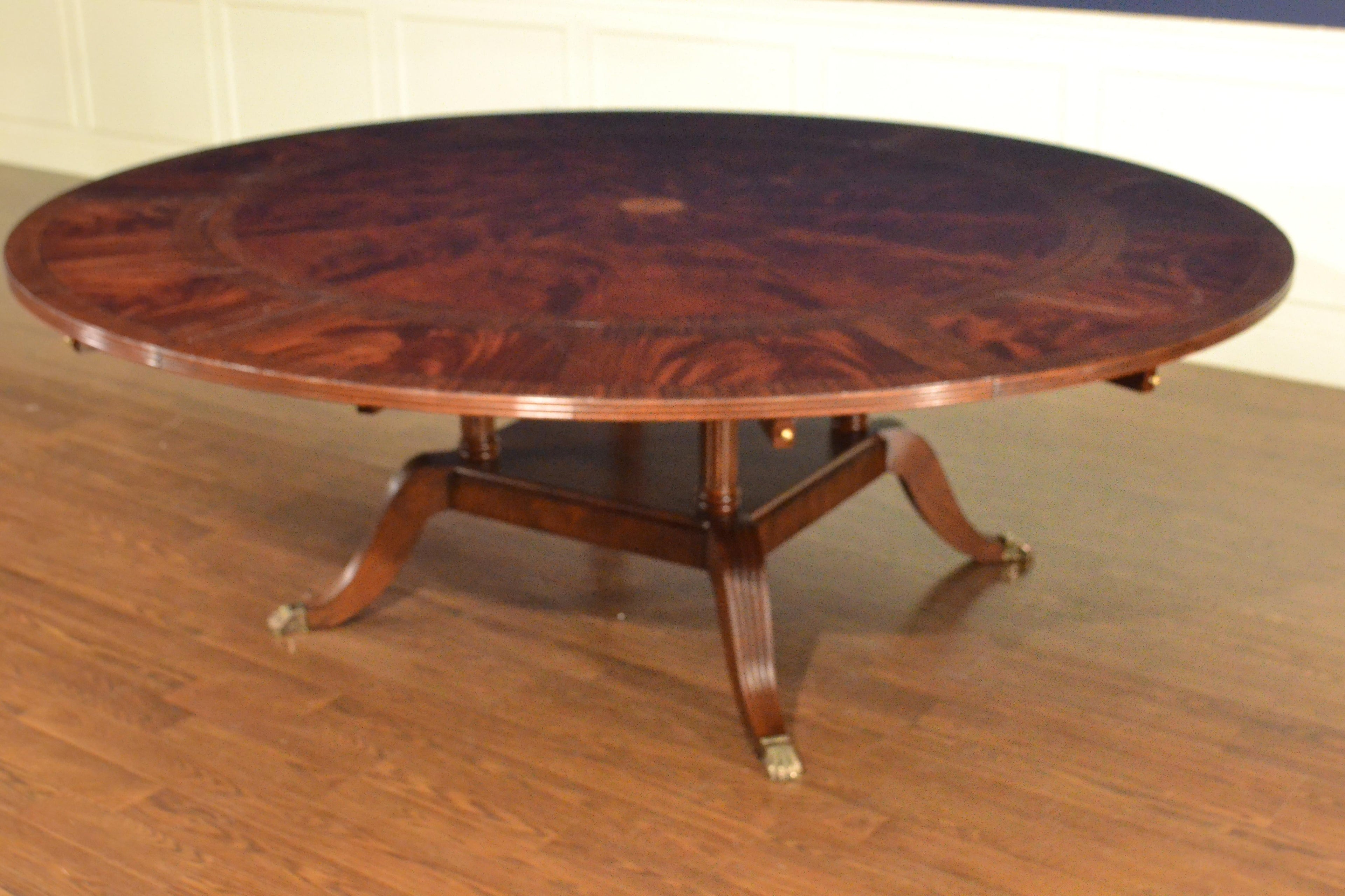 https://a.1stdibscdn.com/large-round-perimeter-leaf-mahogany-georgian-style-dining-table-by-leighton-hall-for-sale-picture-9/f_44162/f_146972821557706176606/38CCEC9F_CE36_494D_8242_7B4433B43C3B_master.jpeg