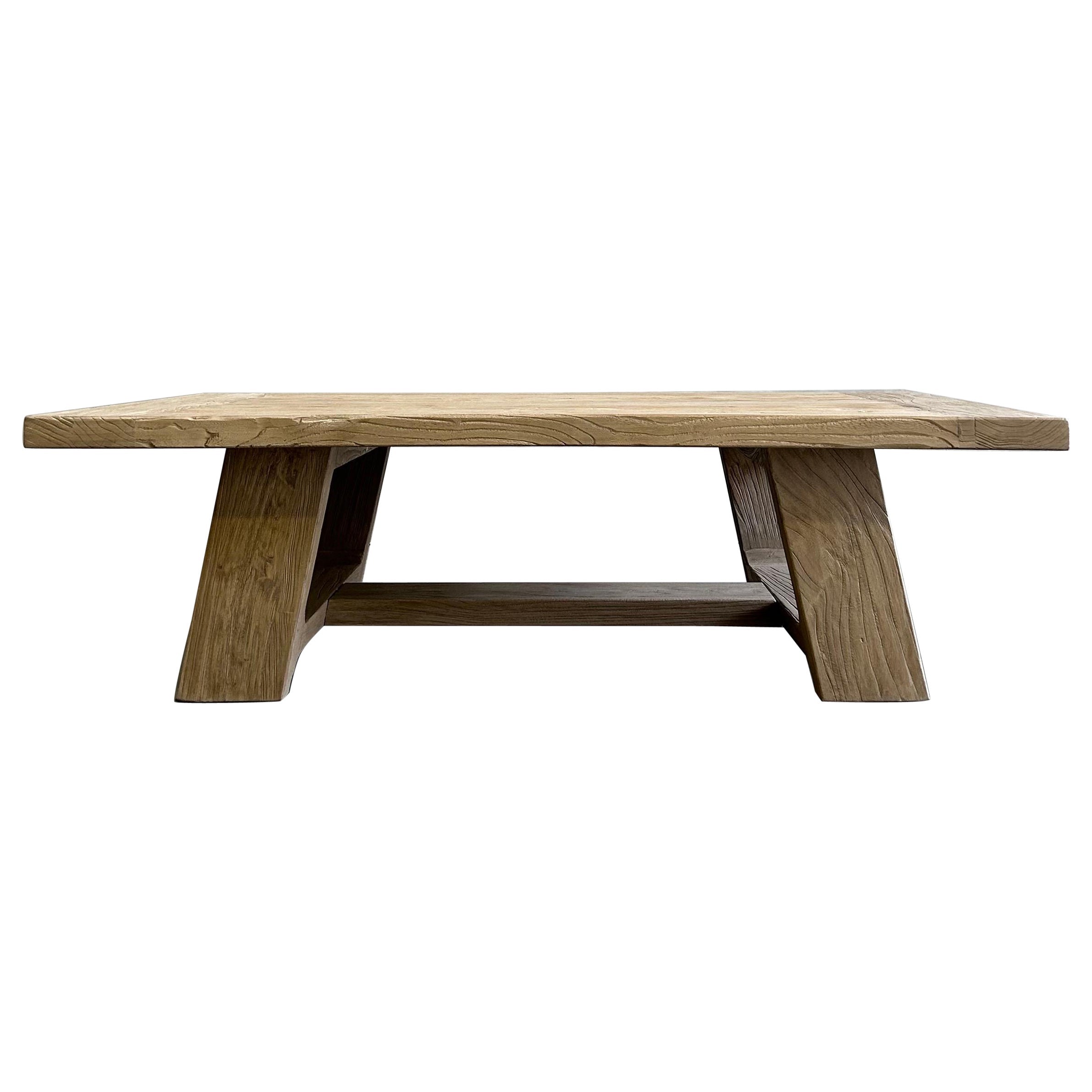 https://a.1stdibscdn.com/reclaimed-elm-wood-coffee-table-for-sale/f_18223/f_492966321773945287826/39062132_datamatics.jpg