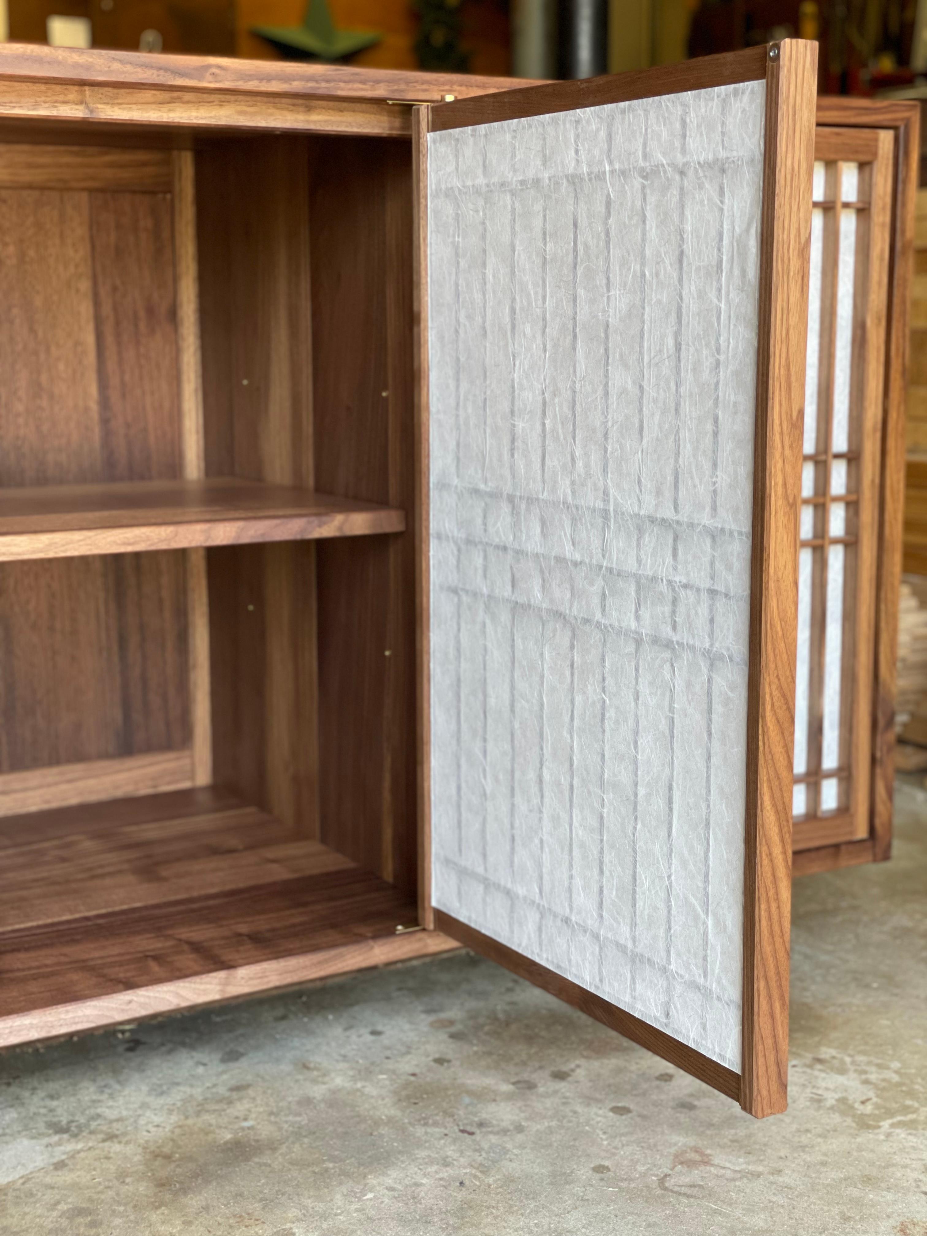 https://a.1stdibscdn.com/walnut-media-cabinet-room-divider-with-shoji-doors-for-sale-picture-2/f_45782/f_291309321655341947264/3AE273AD_CF4A_4475_B3EE_26BCB6B71891_master.jpeg