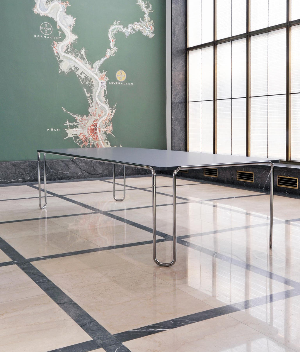 https://a.1stdibscdn.com/large-modernist-custom-made-ultra-thin-tubular-steel-table-by-gmd-berlin-for-sale-picture-5/f_19723/f_413005421725263064224/3_MODERN_XX_GMD_Berlin_Stahlrohr_Schlaufentisch_Tubular_steel_table_master.jpg