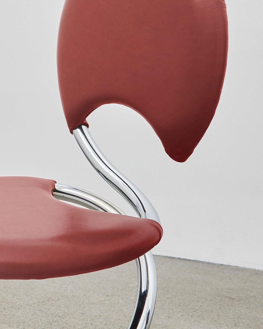 https://a.1stdibscdn.com/ph-snake-chair-chrome-leather-extreme-indianred-full-leather-upholstery-for-sale-picture-3/22569652/f_214961021605857990110/3_master.jpg