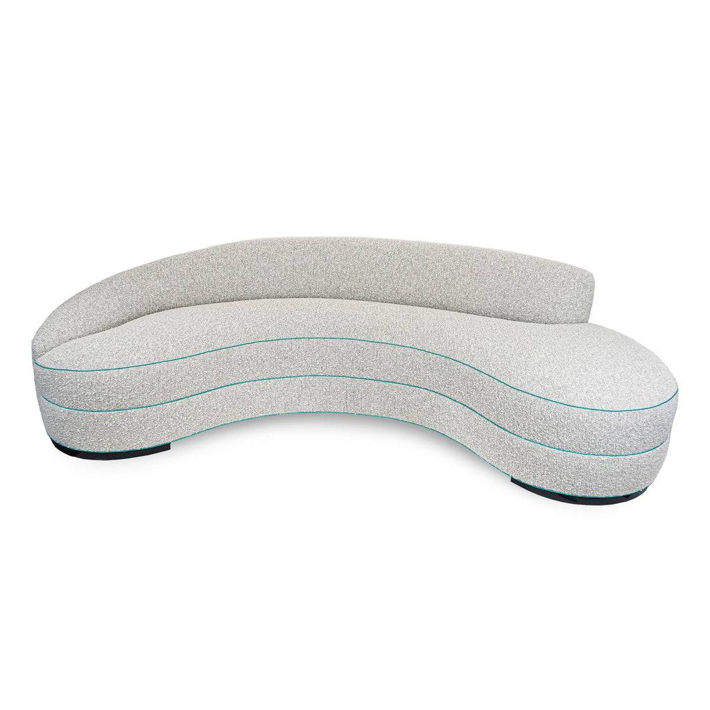 https://a.1stdibscdn.com/boucle-curved-sofa-with-turquoise-accents-for-sale-picture-3/f_21233/1622750896748/3_master.jpg