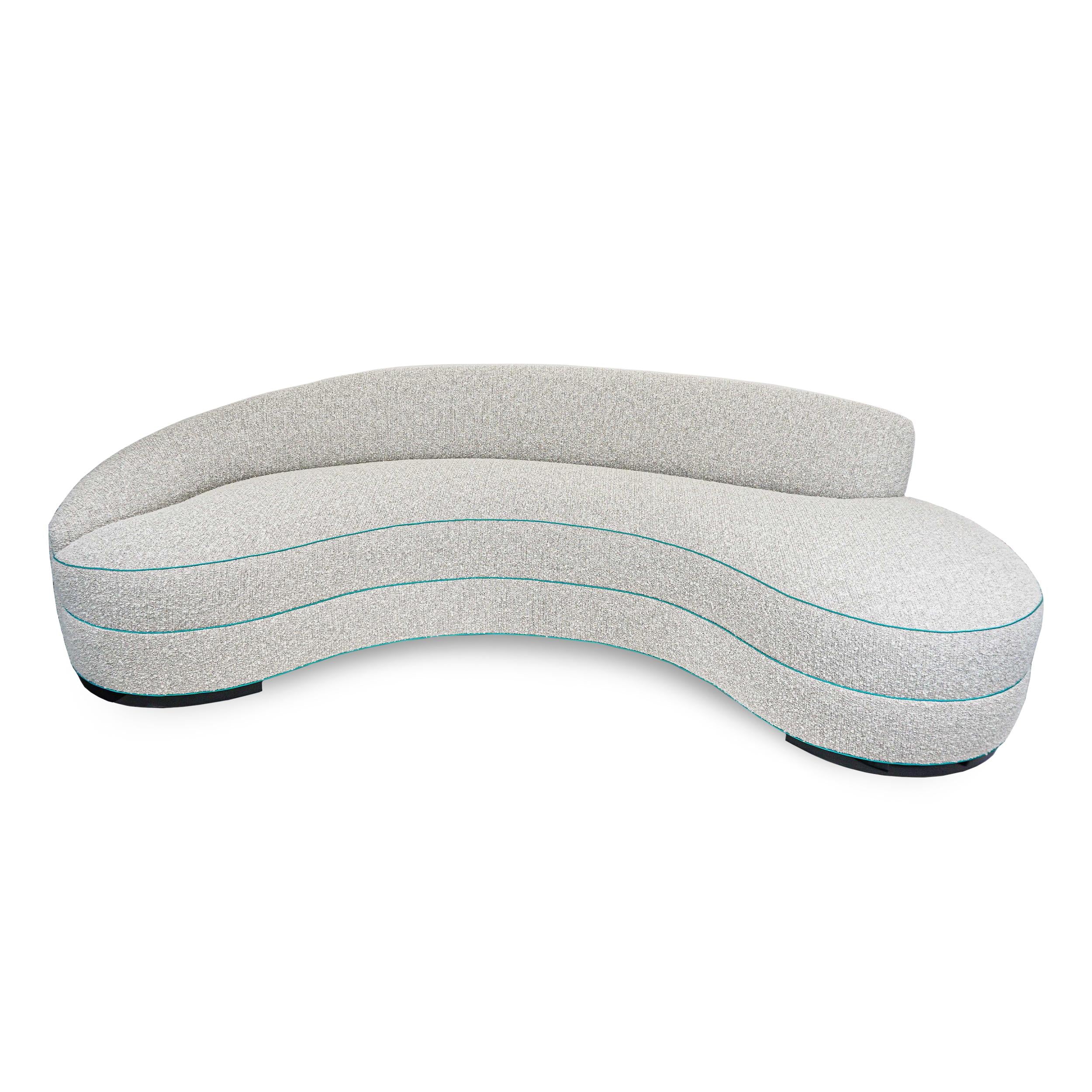 https://a.1stdibscdn.com/boucle-curved-sofa-with-turquoise-accents-for-sale-picture-3/f_21233/1622750896748/3_master.jpg