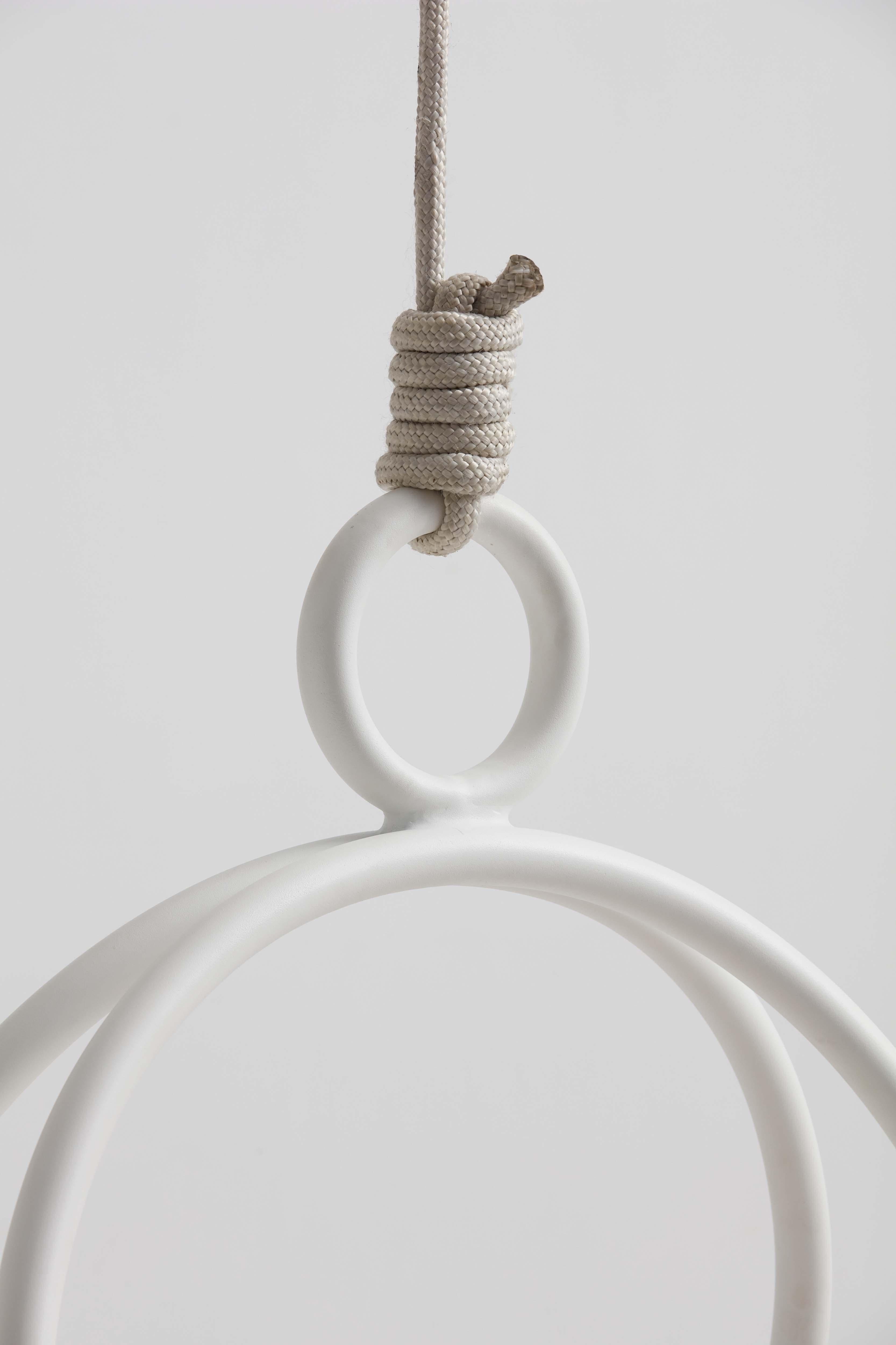 https://a.1stdibscdn.com/oca-minimalist-hanging-swing-chair-by-tiago-curioni-in-aluminium-for-sale-picture-3/f_31871/f_244579221625780310960/3_master.jpg