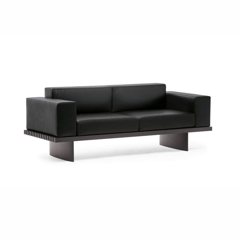 https://a.1stdibscdn.com/charlotte-perriand-refolo-modular-sofa-wood-and-black-leather-by-cassina-for-sale-picture-2/f_14272/f_284298421651142831815/3_master.jpg?width=768
