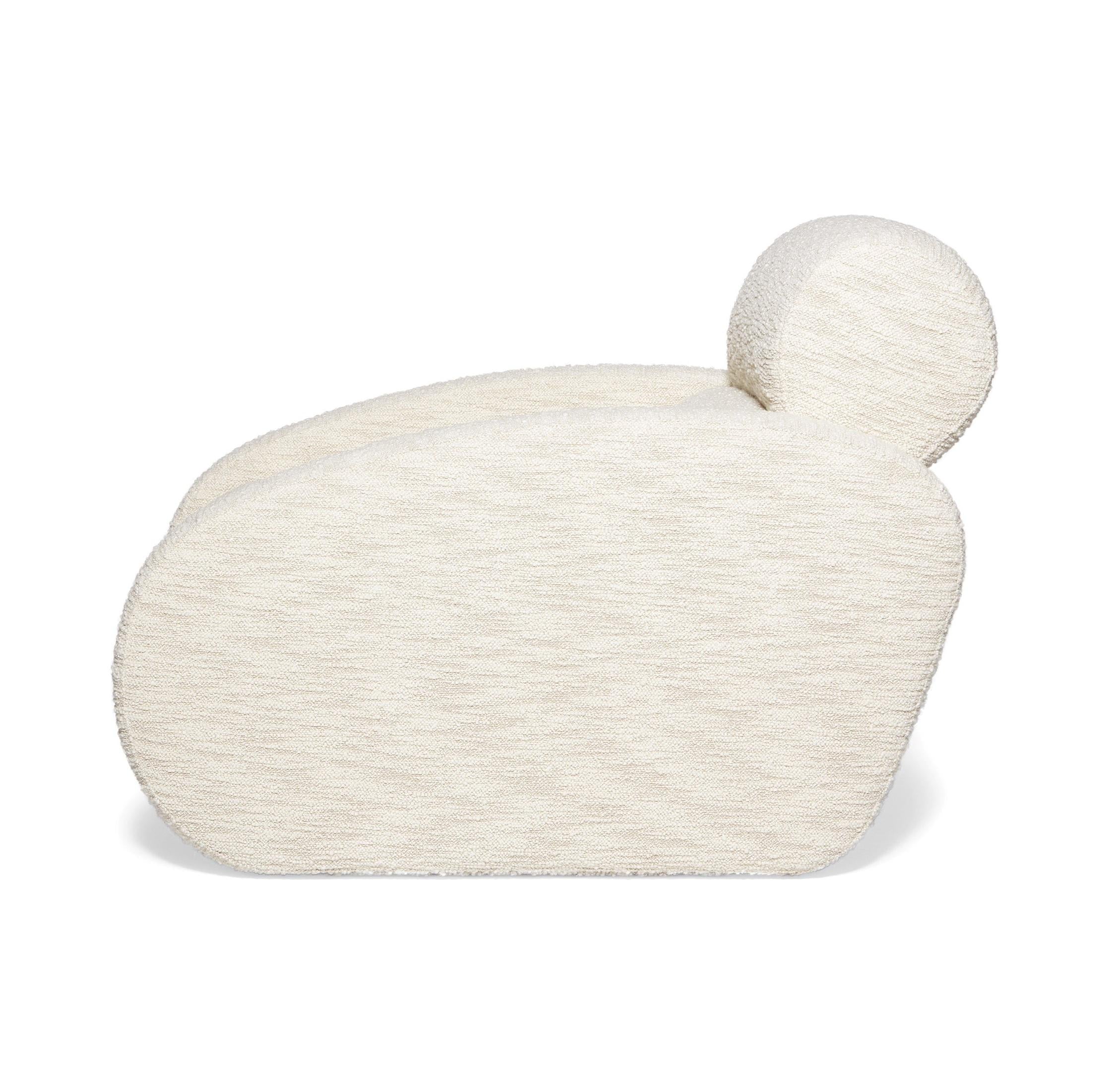 https://a.1stdibscdn.com/relaxing-boucle-armchair-with-curvy-silhouette-for-sale-picture-3/f_27693/f_330470421677674854364/3_master.jpg