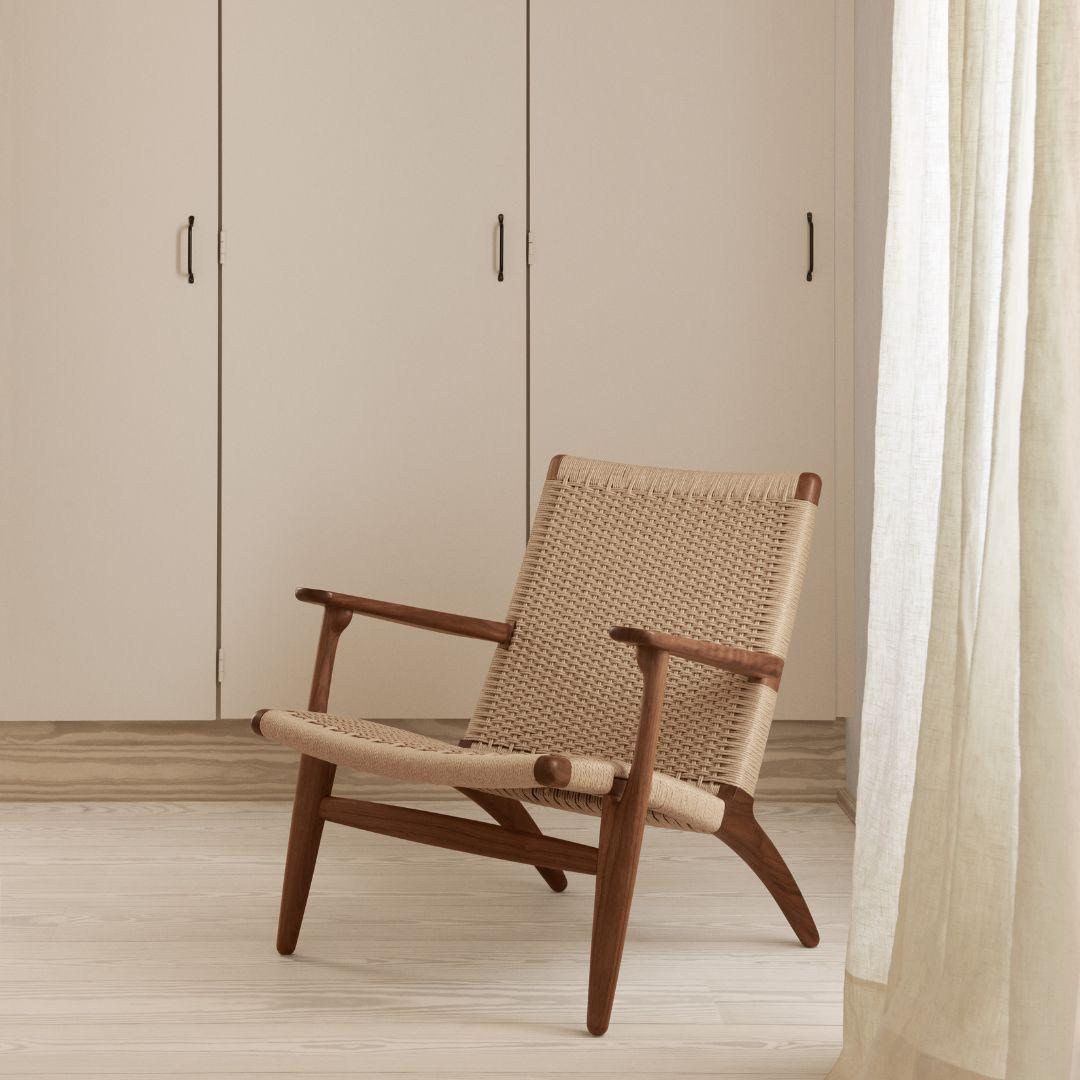 https://a.1stdibscdn.com/hans-j-wegner-ch25-chair-in-walnut-oil-papercord-for-carl-hansen-son-for-sale-picture-3/f_14472/f_316522321670534986031/3_master.jpg