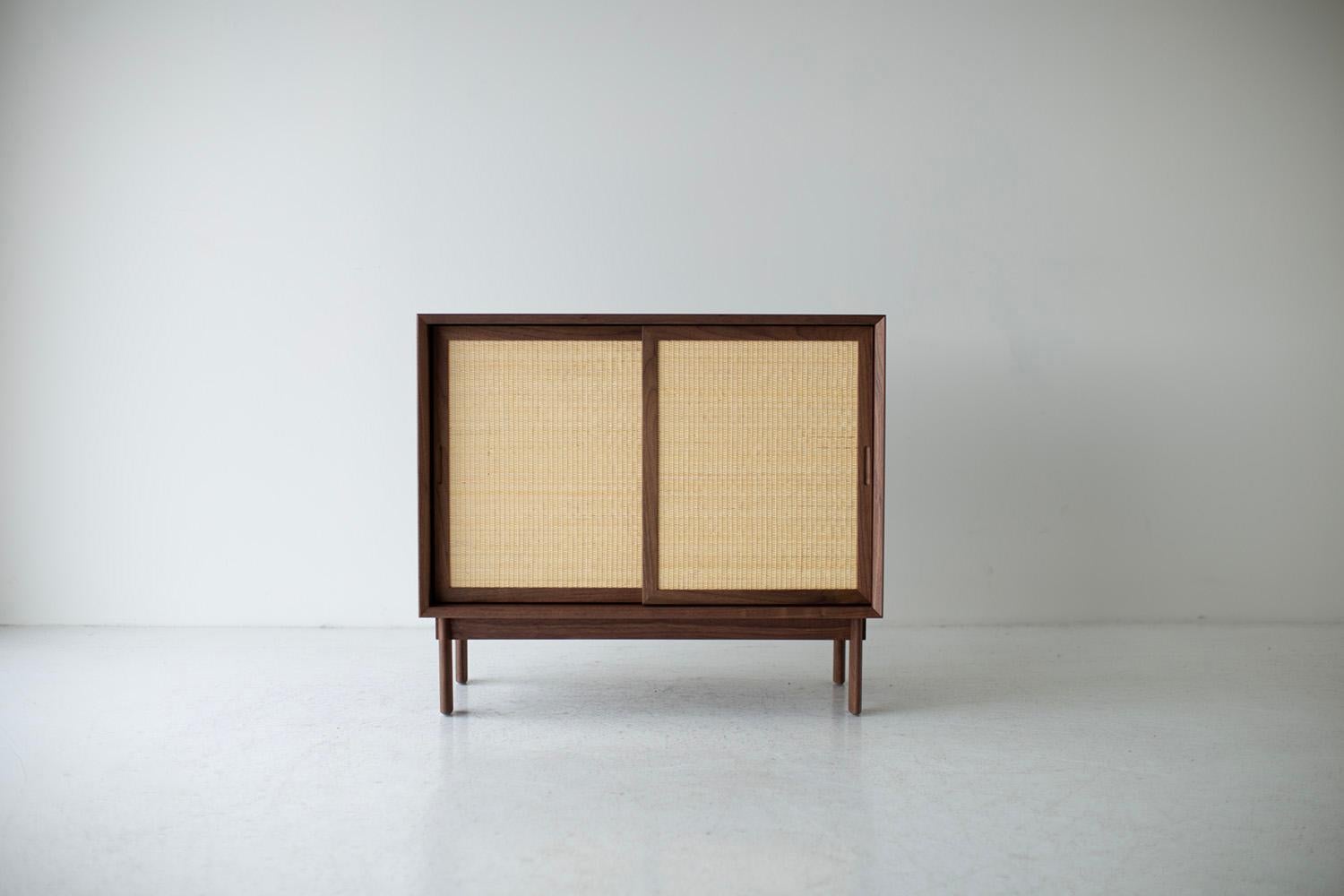 https://a.1stdibscdn.com/craftassociates-credenza-peabody-modern-walnut-credenza-cane-for-sale-picture-2/f_9720/f_302202121701284233324/42110190_modern_walnut_credenza_57904132_master.jpg