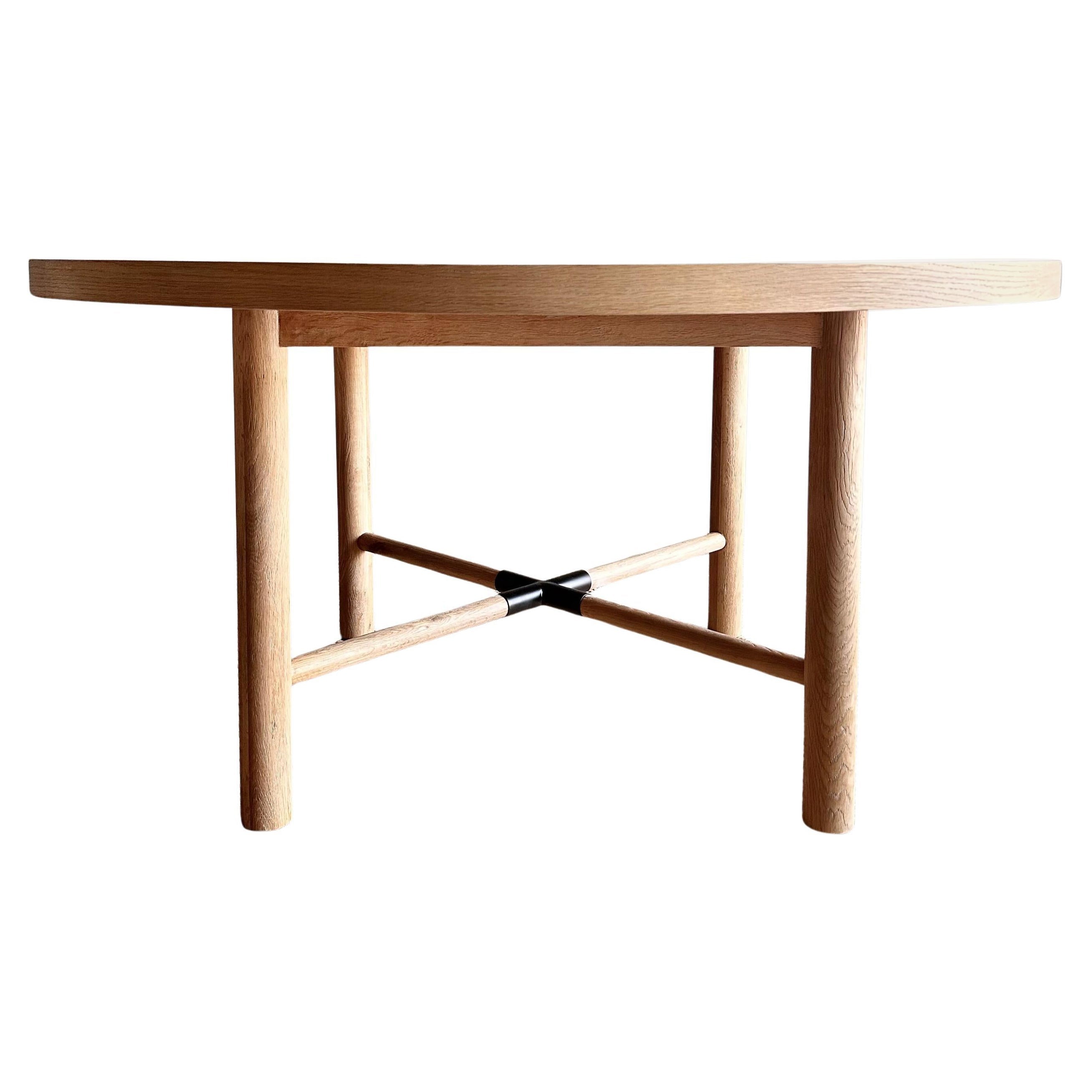 https://a.1stdibscdn.com/round-dining-table-in-natural-white-oak-finish-for-sale/1121189/f_427296621734161415199/42729662_datamatics.jpg