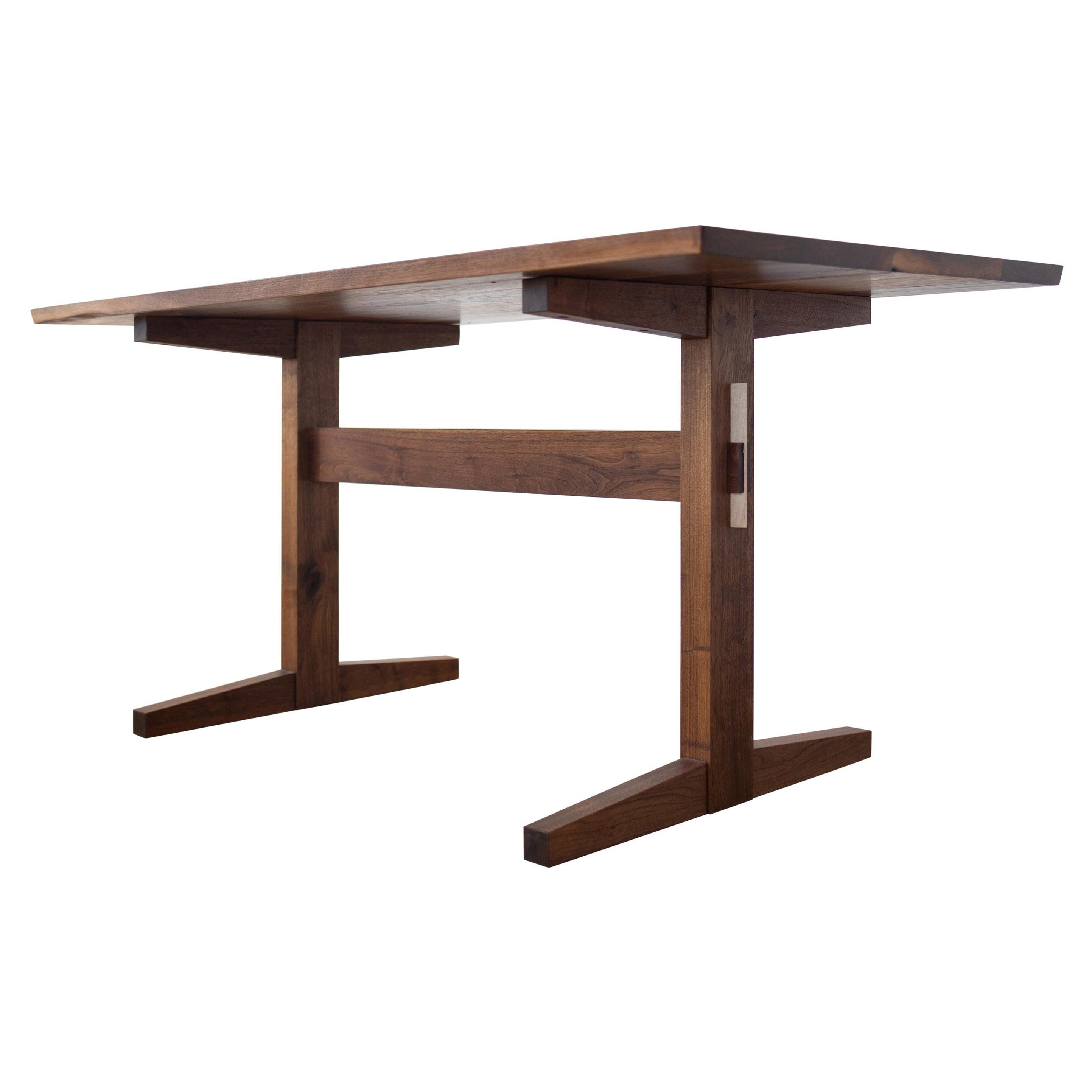 https://a.1stdibscdn.com/hana-walnut-trestle-dining-table-in-stock-for-sale/1121189/f_428426721734770349036/42842672_datamatics.jpg