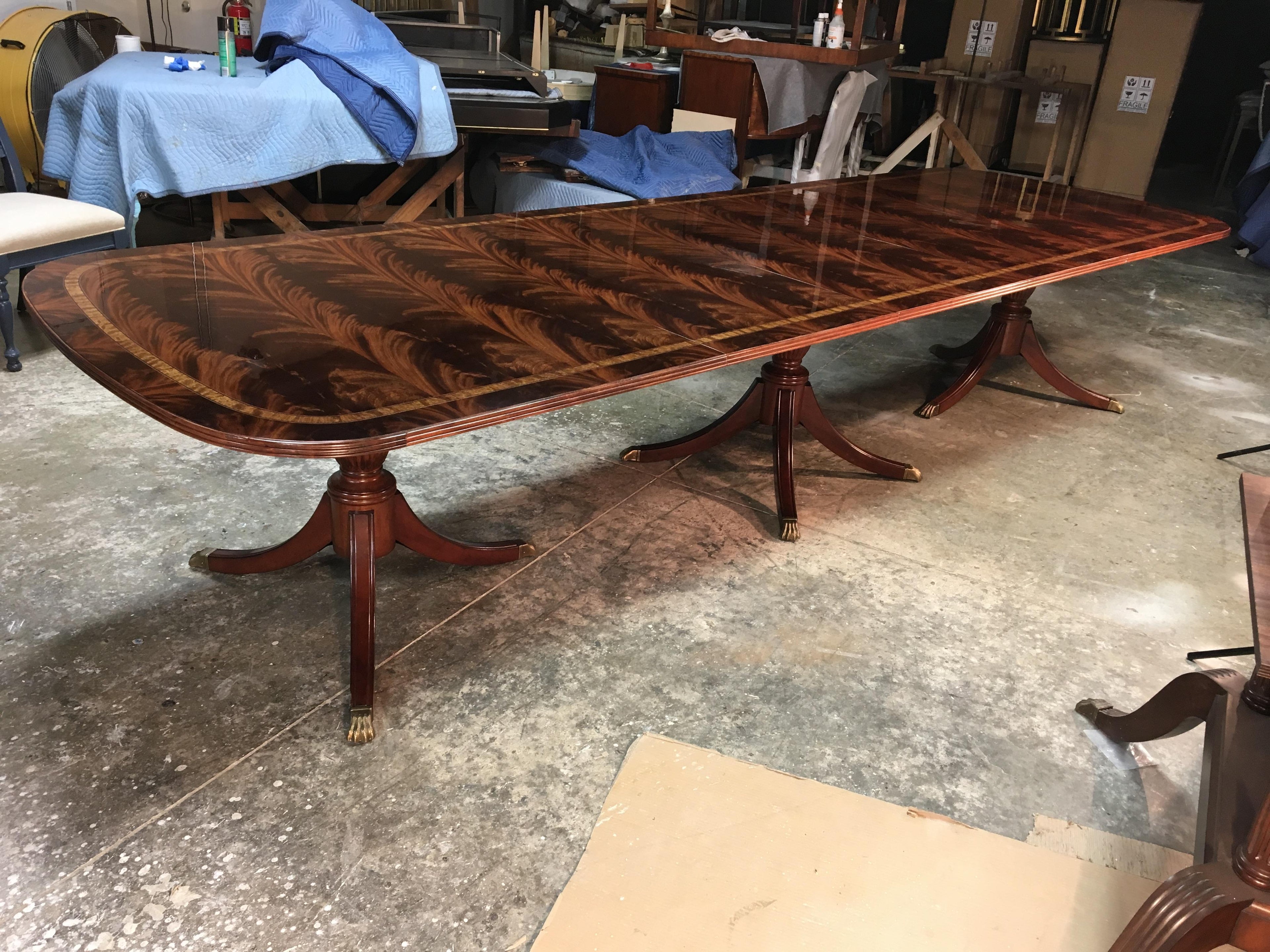 https://a.1stdibscdn.com/traditional-mahogany-georgian-style-banquet-dining-table-by-leighton-hall-for-sale-picture-8/f_44162/f_135445721549657957502/430BEF60_1247_4E2D_B48D_72E68AA1919F_master.jpeg