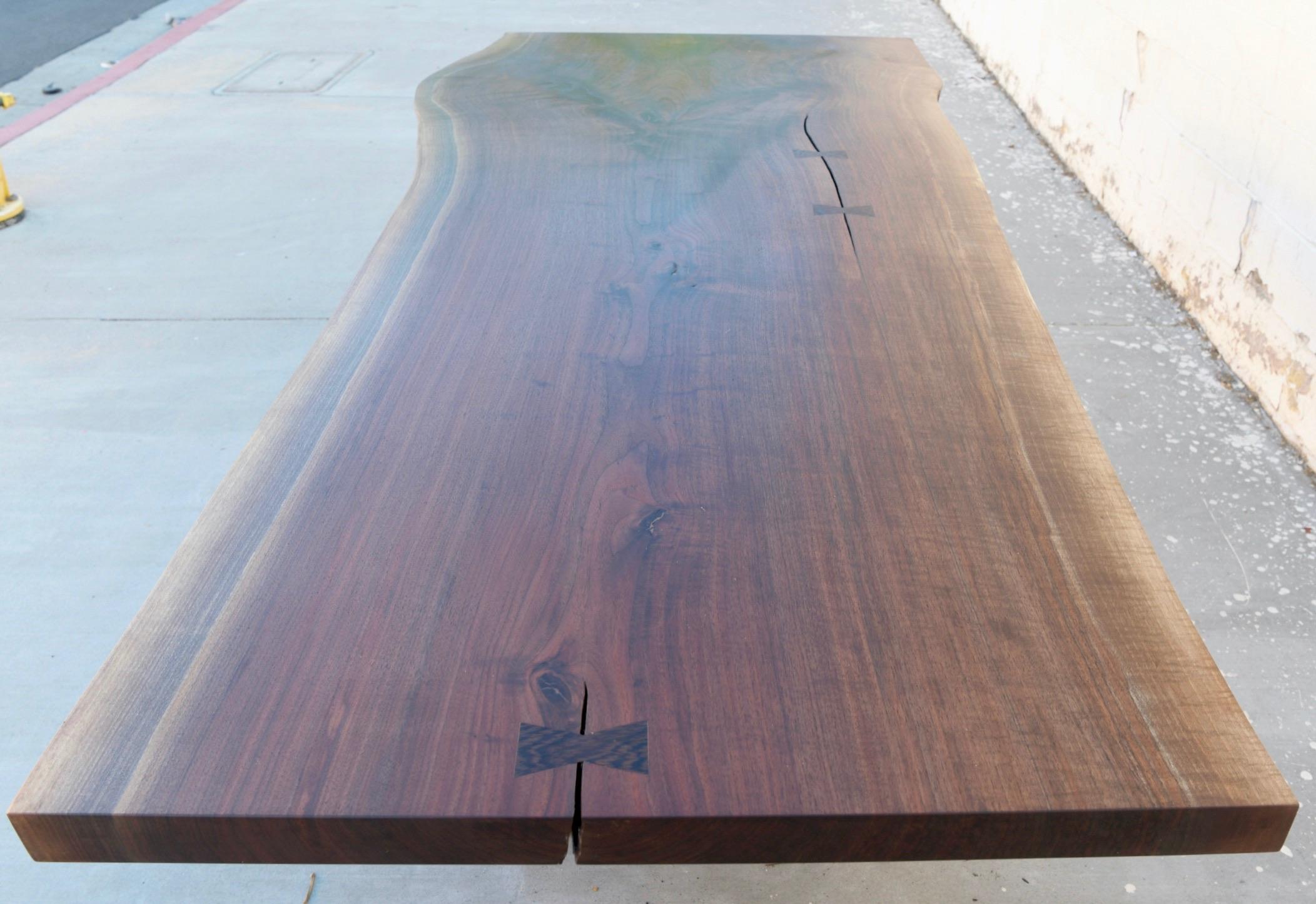 https://a.1stdibscdn.com/walnut-slab-live-edge-dining-table-custom-made-by-petersen-antiques-for-sale-picture-6/f_8065/1597847492454/4387B739_A27D_4F9C_AD54_A0F05FB98DE3_master.jpeg