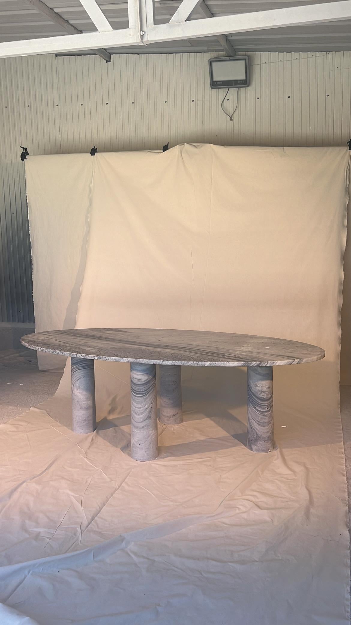 https://a.1stdibscdn.com/large-oval-marble-dining-table-with-column-legs-in-the-style-of-mario-bellini-for-sale-picture-2/f_80522/f_409995421723147307151/44535446_36C9_4FCF_9AB4_E1116D623D56_master.JPG