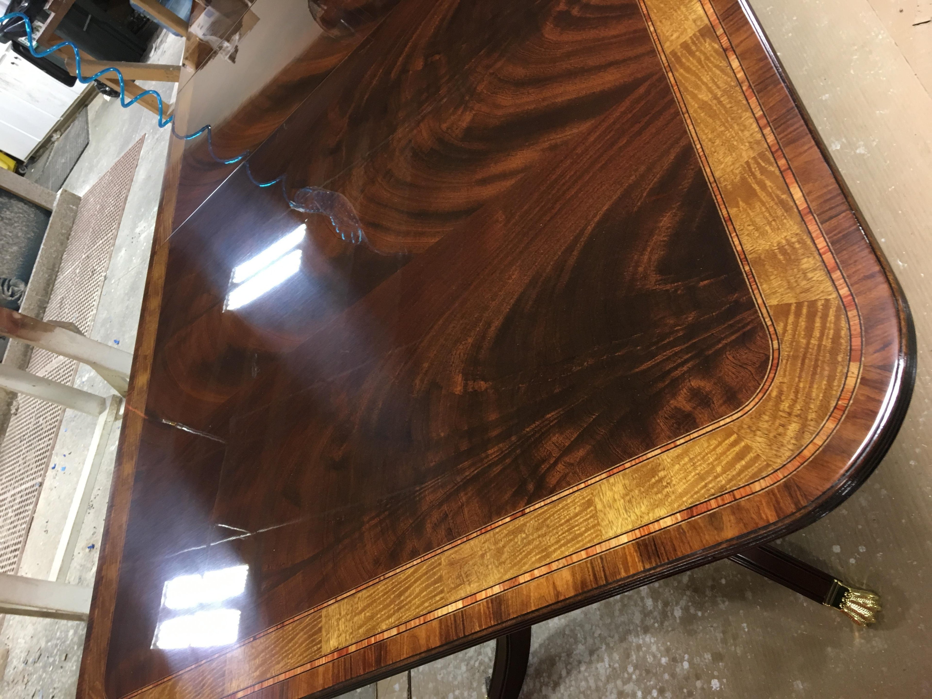 https://a.1stdibscdn.com/large-mahogany-georgian-style-dining-table-by-leighton-hall-for-sale-picture-9/f_44162/f_13542132/44FC90F8_3A84_4F0B_B0E8_1549111180378_master.jpeg