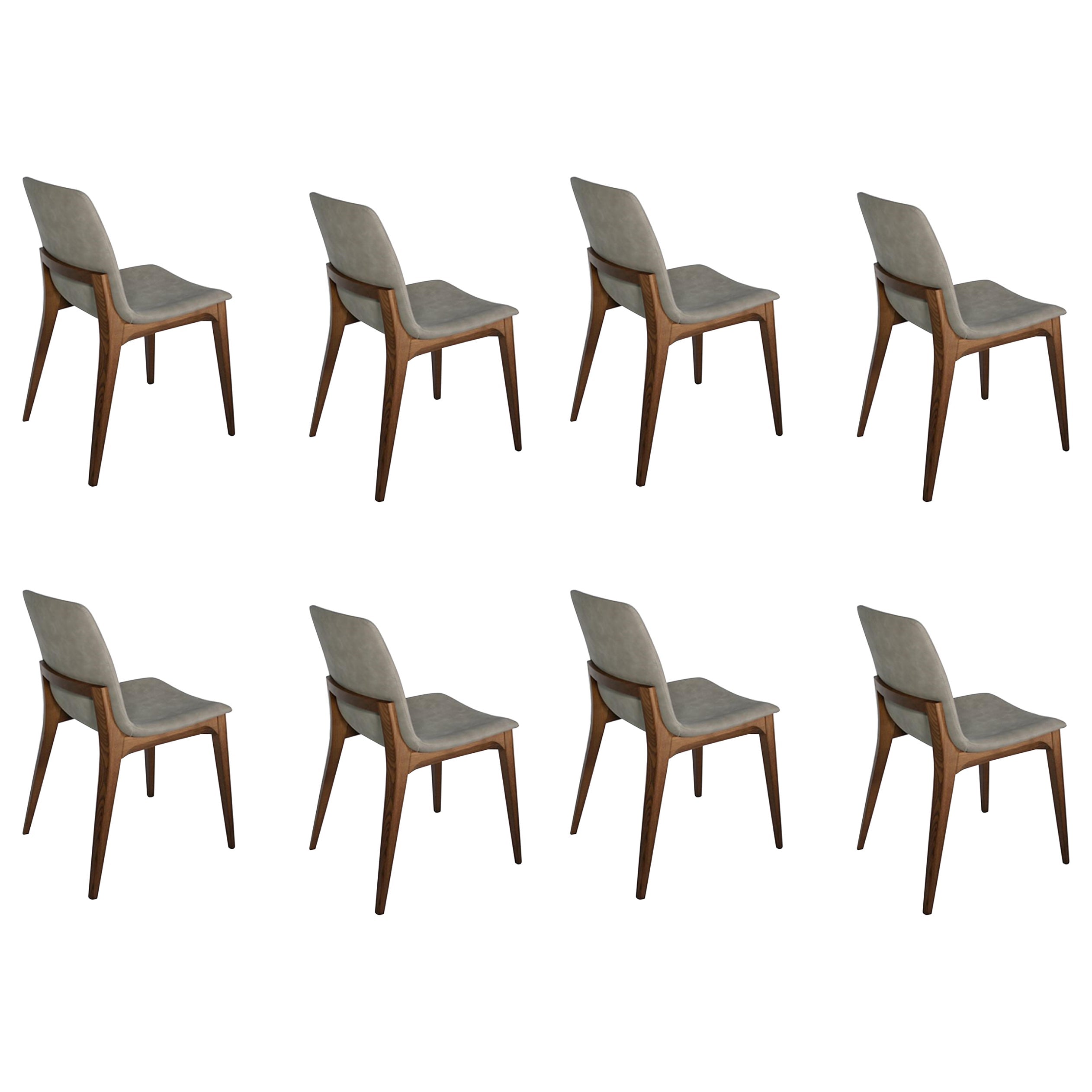 https://a.1stdibscdn.com/contemporary-set-of-8-chairs-by-studio-tecnico-interna8-wood-leather-for-sale/1121189/f_458232521752308375340/45823252_datamatics.jpg