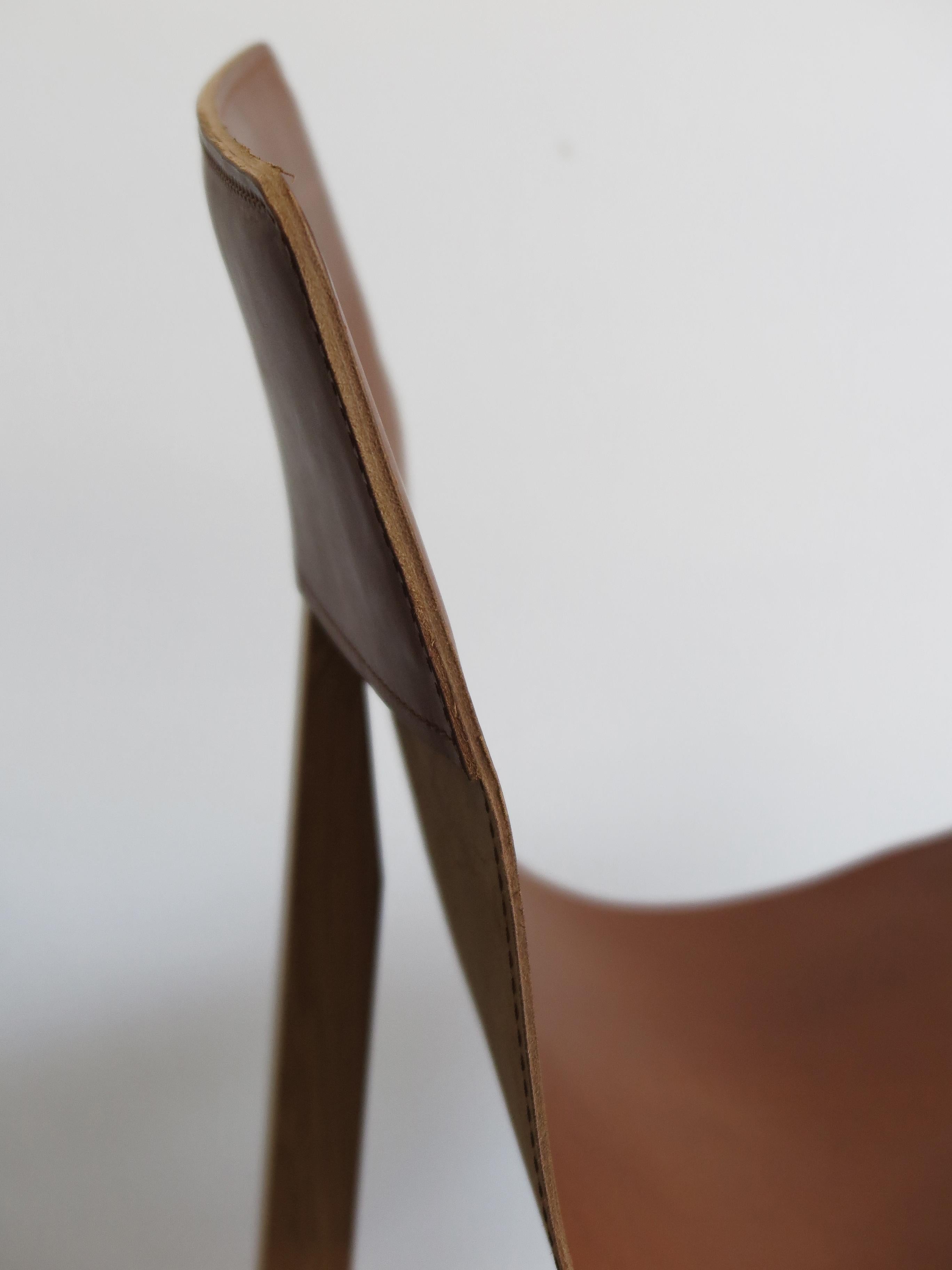 https://a.1stdibscdn.com/angelo-mangiarotti-italian-leather-and-wood-dining-chairs-for-agapecasa-for-sale-picture-7/f_33883/f_286152021652275381970/4622_Angelo_Mangiarotti_sedie_T3_f_master.JPG