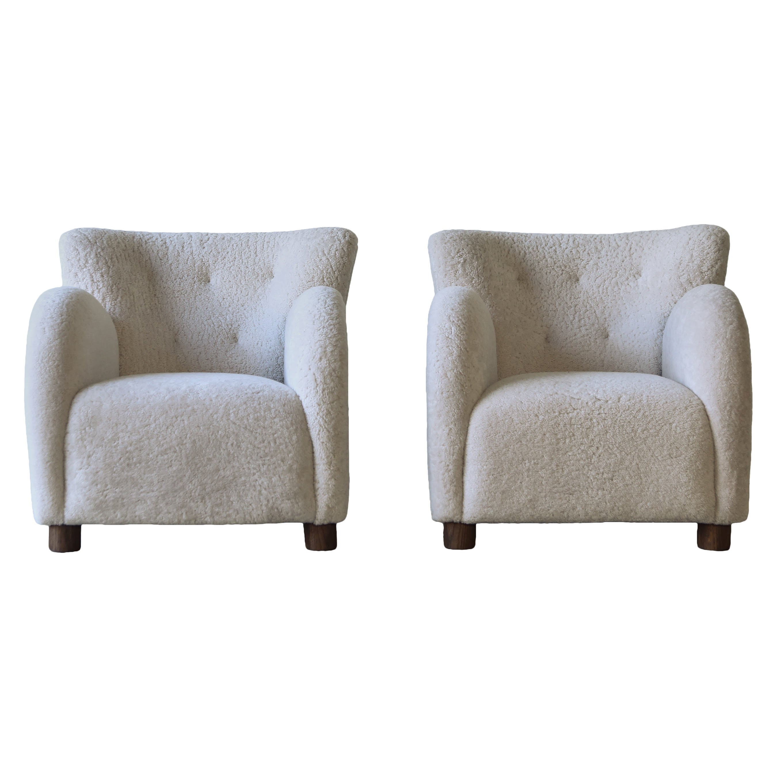 https://a.1stdibscdn.com/superb-pair-of-lounge-chairs-upholstered-in-natural-sheepskin-for-sale/1121189/f_462734021755340455274/46273402_datamatics.jpg