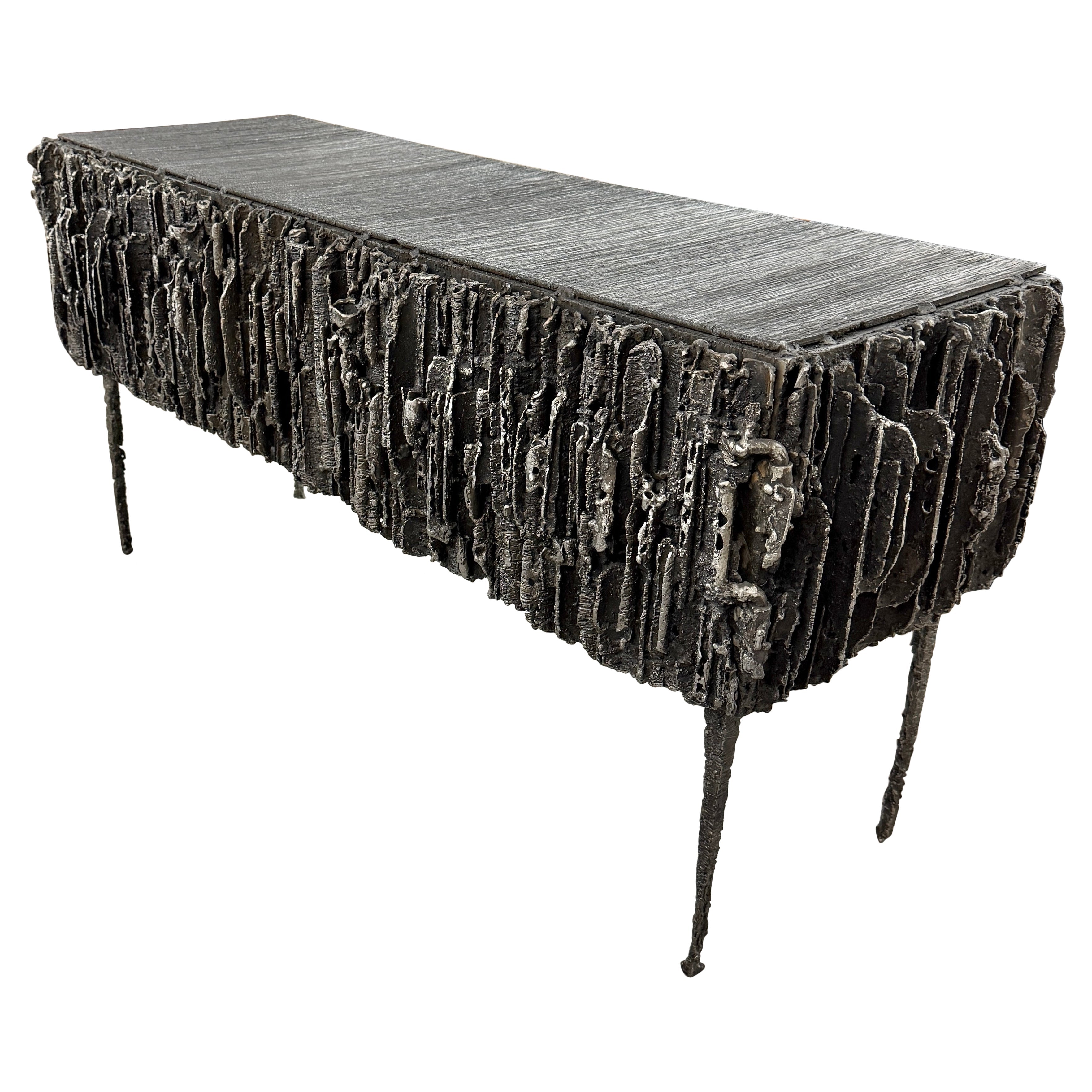 https://a.1stdibscdn.com/2021-james-bearden-brutalist-corinthian-cabinet-in-plasma-carved-steel-for-sale/1121189/f_464729721756813056250/46472972_datamatics.jpeg