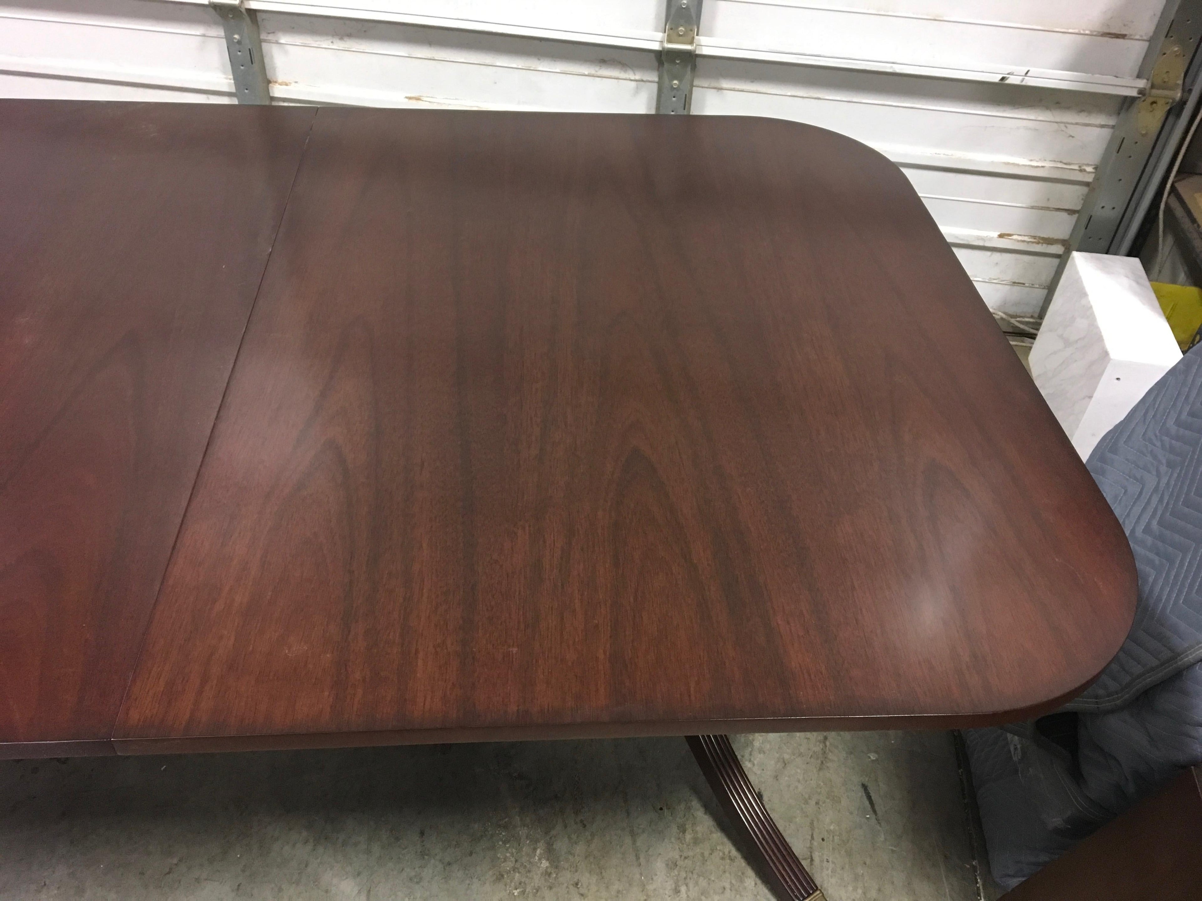 https://a.1stdibscdn.com/custom-cathedral-mahogany-georgian-style-dining-table-by-leighton-hall-for-sale-picture-4/f_44162/f_153911621562621258267/480BC8FF_5D24_4D0C_8EBD_5127DD307942_master.jpeg
