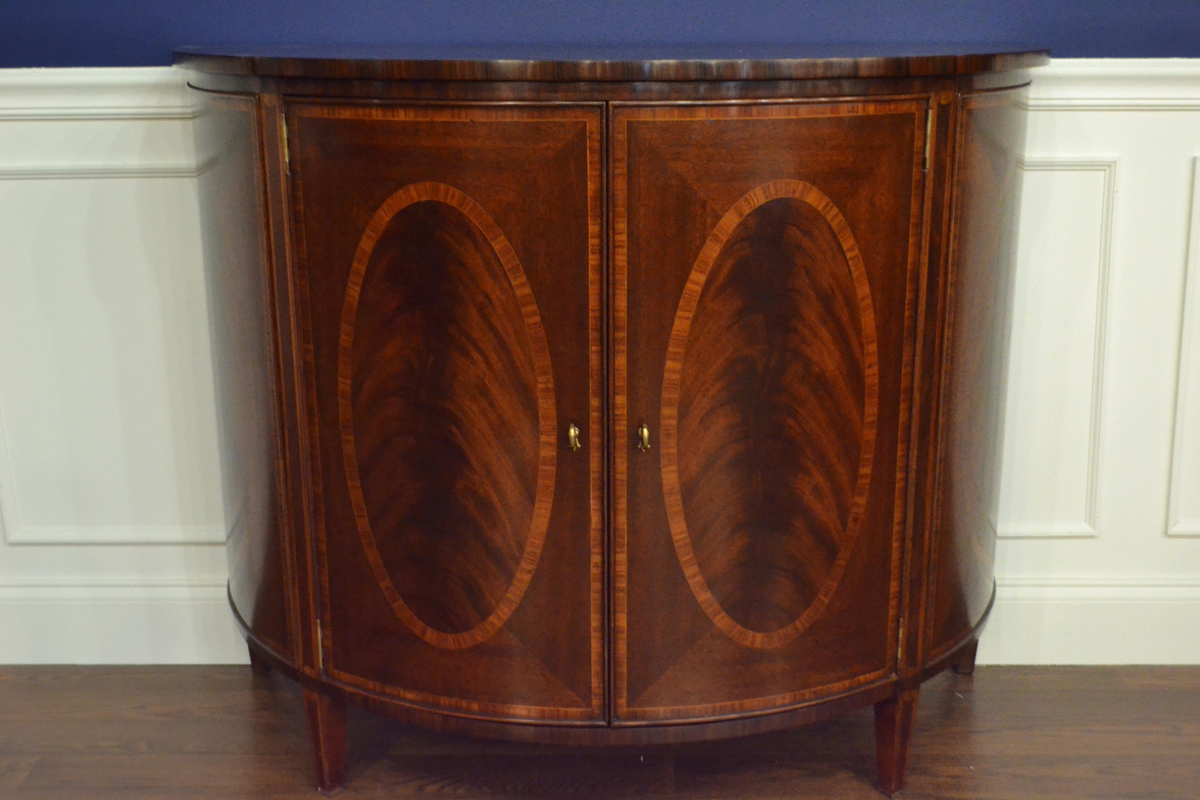 https://a.1stdibscdn.com/hepplewhite-style-mahogany-demilune-cabinet-by-leighton-hall-for-sale-picture-2/f_44162/f_154696221563149426289/4CDA19C8_CC82_4451_8042_EEB13B0E6138_master.jpeg