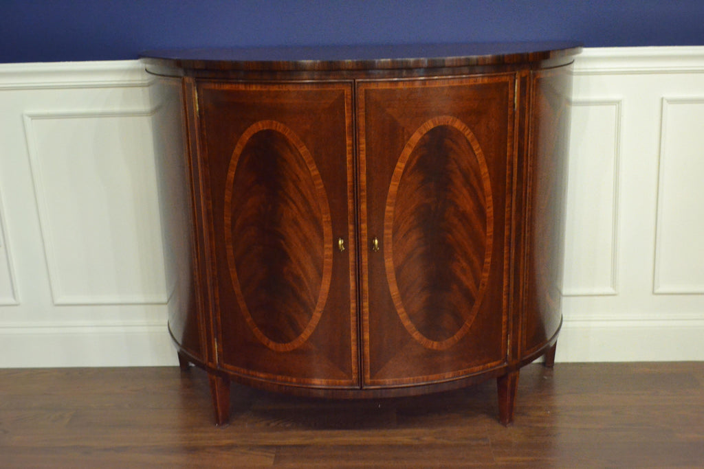 https://a.1stdibscdn.com/hepplewhite-style-mahogany-demilune-cabinet-by-leighton-hall-for-sale-picture-4/f_44162/f_154696221563149516835/4F939764_47FF_4051_866B_CBB7DF97C289_master.jpeg