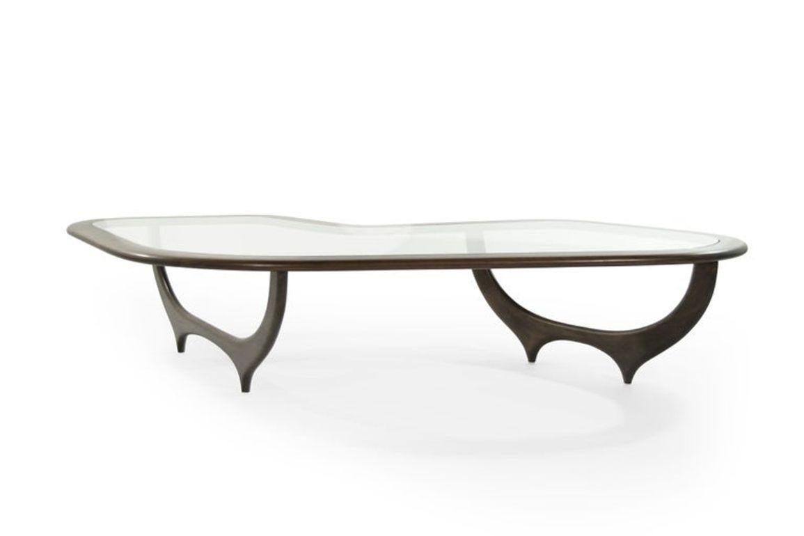 https://a.1stdibscdn.com/the-contour-coffee-table-in-walnut-by-stamford-modern-for-sale-picture-5/f_9289/f_345223121685456136653/4_ICO_PARISI_S_CTABLE_1_master_master.jpeg