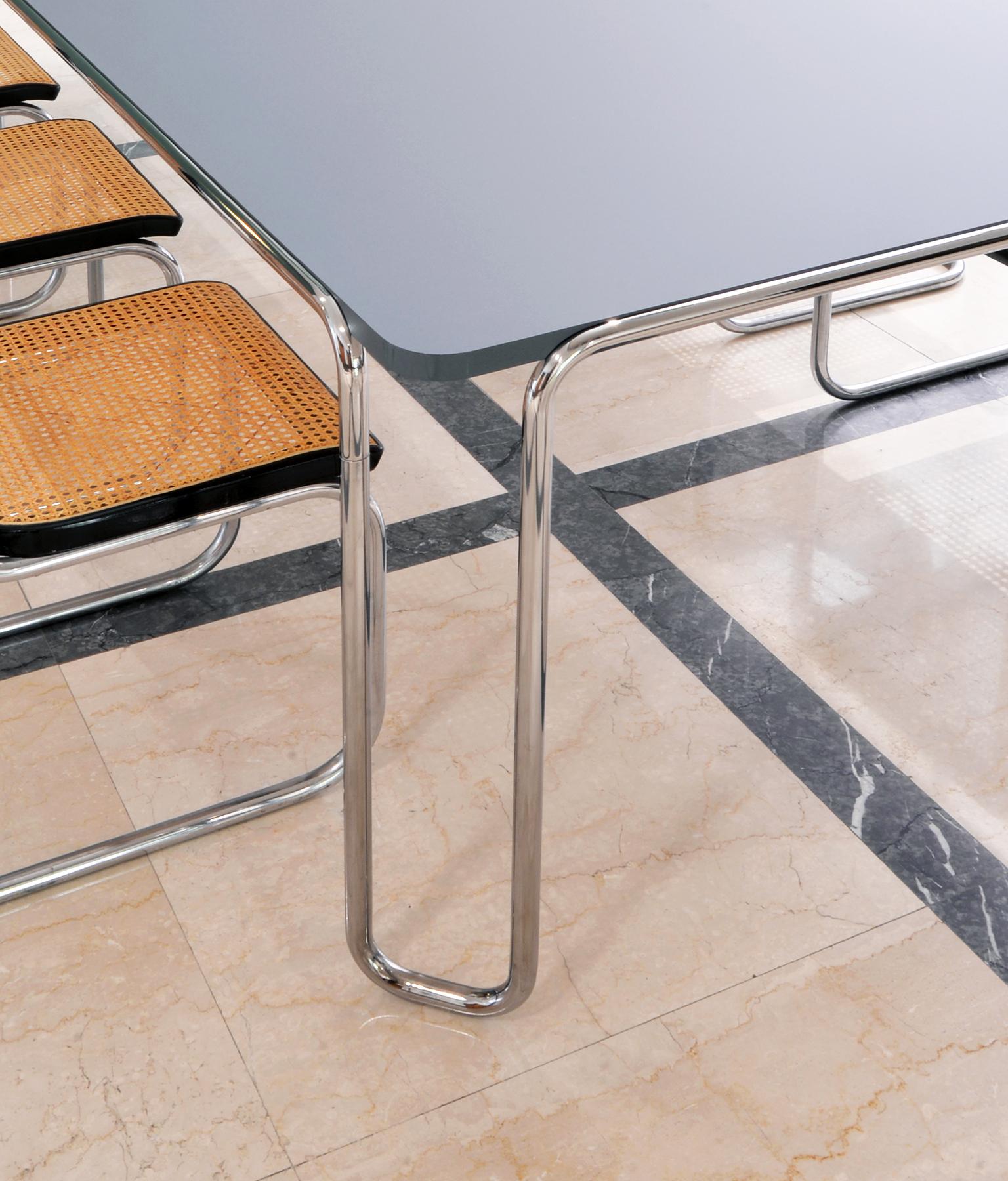 https://a.1stdibscdn.com/large-modernist-custom-made-ultra-thin-tubular-steel-table-by-gmd-berlin-for-sale-picture-6/f_19723/f_413005421725263065197/4_MODERN_XX_GMD_Berlin_Stahlrohr_Schlaufentisch_Tubular_steel_table_master.jpg