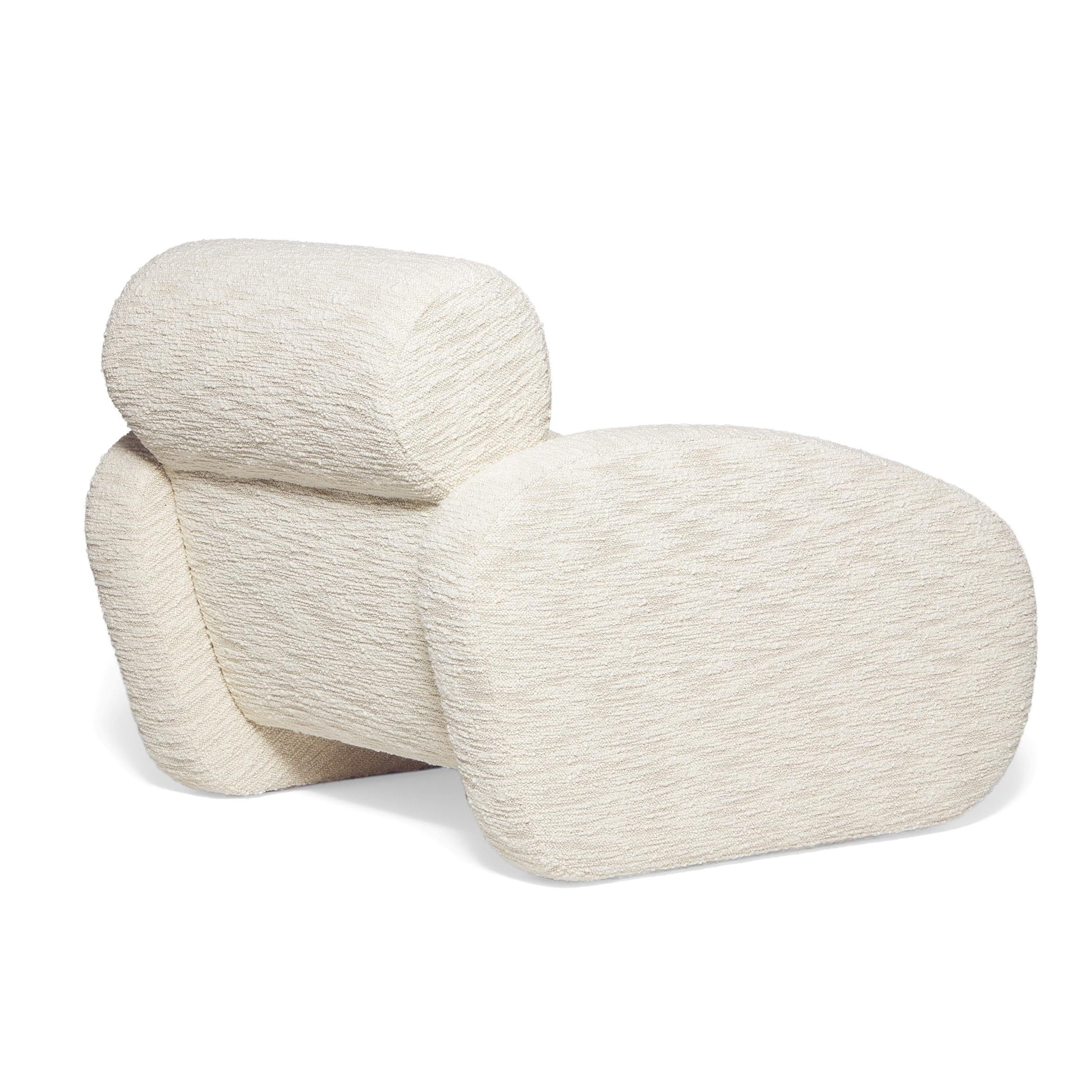 https://a.1stdibscdn.com/relaxing-boucle-armchair-with-curvy-silhouette-for-sale-picture-4/f_27693/f_330470421677674857020/4_master.jpg