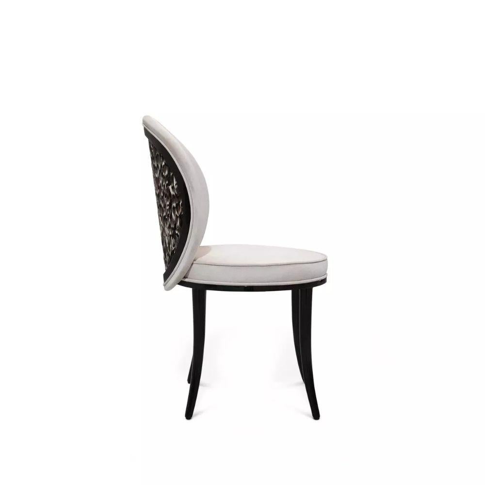 https://a.1stdibscdn.com/merveille-folie-feather-back-dining-chair-for-sale-picture-4/f_74772/f_424907821732703018800/4_master.jpg