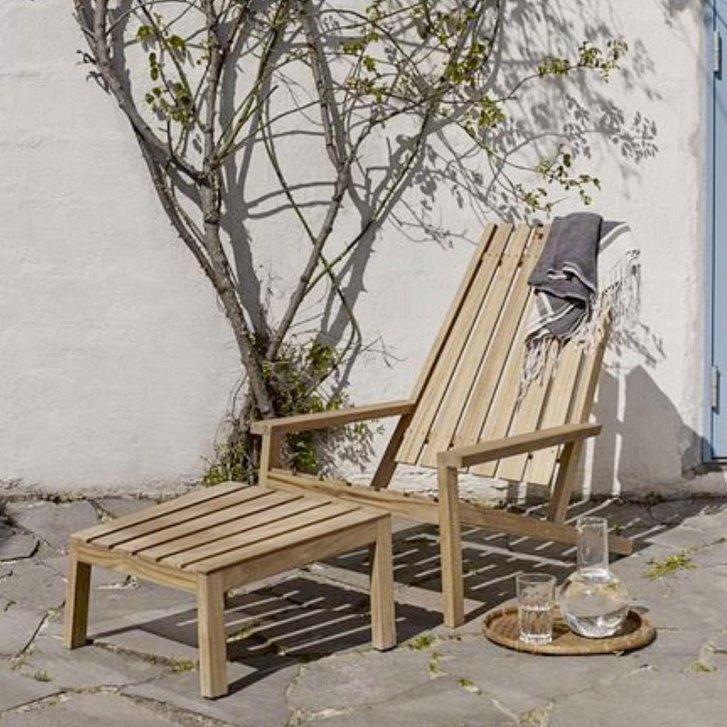 https://a.1stdibscdn.com/stine-weigelt-outdoor-between-lines-teak-lounge-chair-for-skagerak-for-sale-picture-4/f_14472/f_342701921684003130054/4_master.jpg