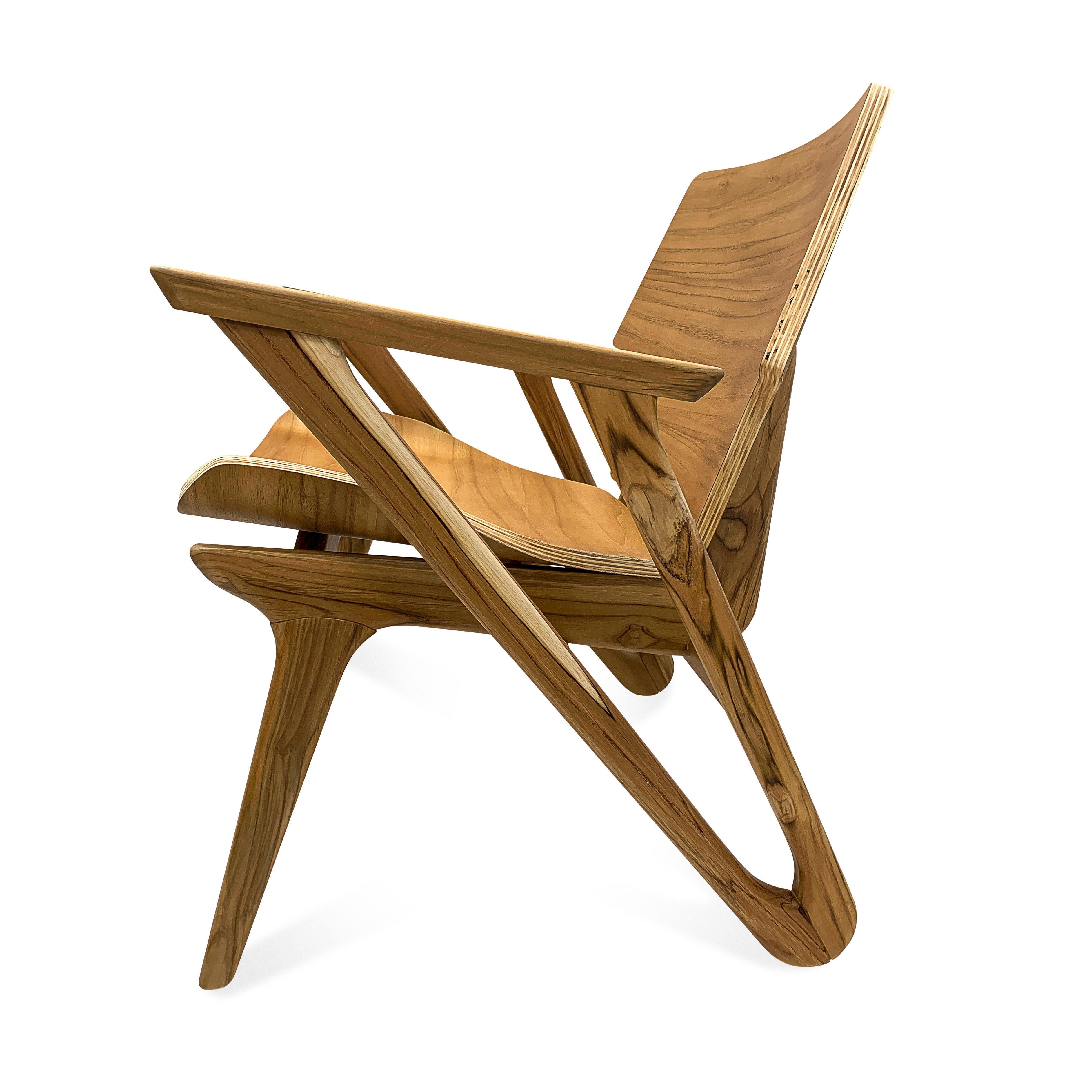 https://a.1stdibscdn.com/velo-armchair-with-shaped-seat-and-shaped-back-in-teak-finish-for-sale-picture-2/f_52822/f_226808221614205003580/50082501_master.jpg