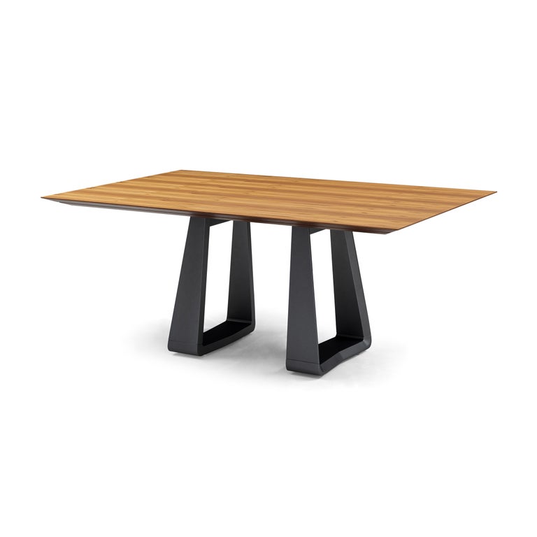 https://a.1stdibscdn.com/wing-67-dining-table-with-chamfered-teak-veneered-top-and-graphite-painted-base-for-sale-picture-2/f_52822/f_264814921639158347517/50101854_MESA_DE_JANTAR_MAD_5230_170X110_WING_087TC_148LT_SEM_VIDRO_EXP_02_master.jpg?width=768