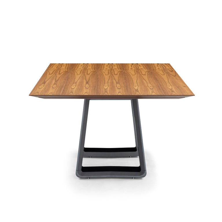 https://a.1stdibscdn.com/wing-67-dining-table-with-chamfered-teak-veneered-top-and-graphite-painted-base-for-sale-picture-3/f_52822/f_264814921639158347210/50101854_MESA_DE_JANTAR_MAD_5230_170X110_WING_087TC_148LT_SEM_VIDRO_EXP_03_master.jpg?width=768