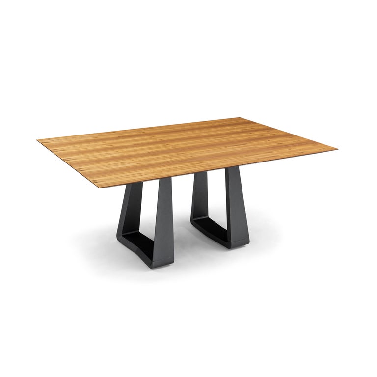 https://a.1stdibscdn.com/wing-67-dining-table-with-chamfered-teak-veneered-top-and-graphite-painted-base-for-sale-picture-4/f_52822/f_264814921639158347767/50101854_MESA_DE_JANTAR_MAD_5230_170X110_WING_087TC_148LT_SEM_VIDRO_EXP_05_master.jpg?width=768