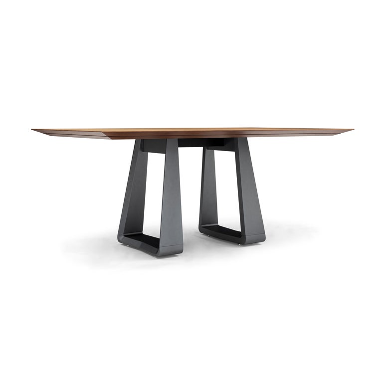 https://a.1stdibscdn.com/wing-67-dining-table-with-chamfered-teak-veneered-top-and-graphite-painted-base-for-sale-picture-5/f_52822/f_264814921639158347987/50101854_MESA_DE_JANTAR_MAD_5230_170X110_WING_087TC_148LT_SEM_VIDRO_EXP_06_master.jpg?width=768