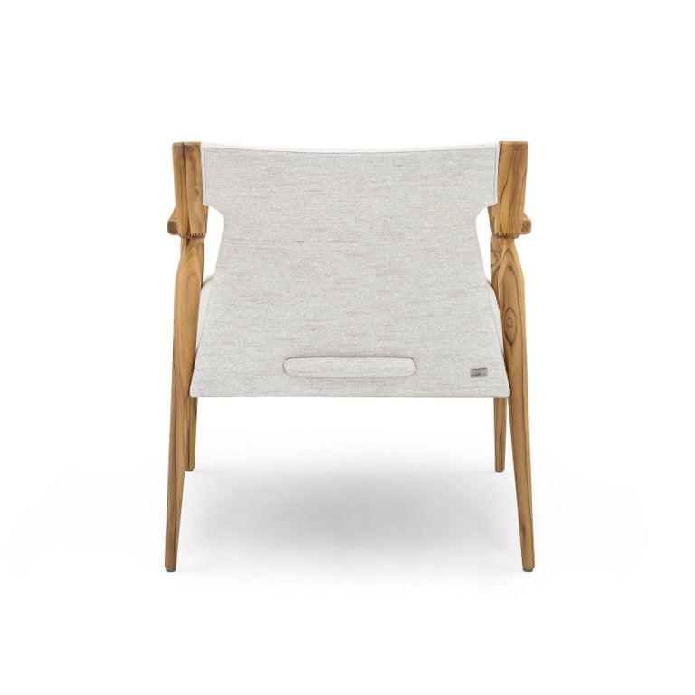 https://a.1stdibscdn.com/mince-armchair-featuring-curved-arms-and-spindle-legs-in-teak-for-sale-picture-2/f_52822/f_329319821677161356698/50103696_POLTRONA_MAD_9806_MINCE_148MT_2316_A_EXP_02_master.JPG?width=768